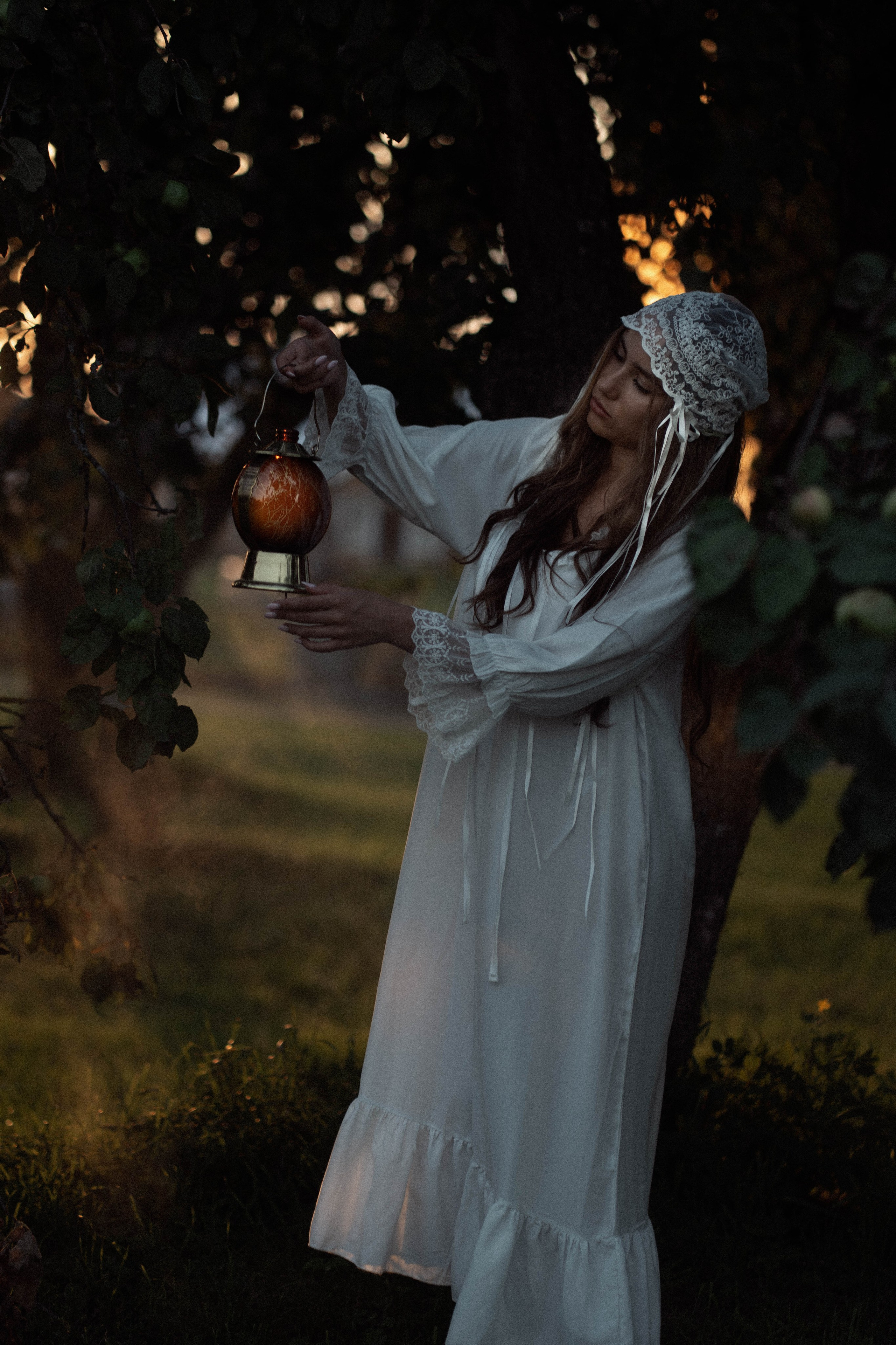 Ugnė obelų sode. Fotografija — Olga Bojarin