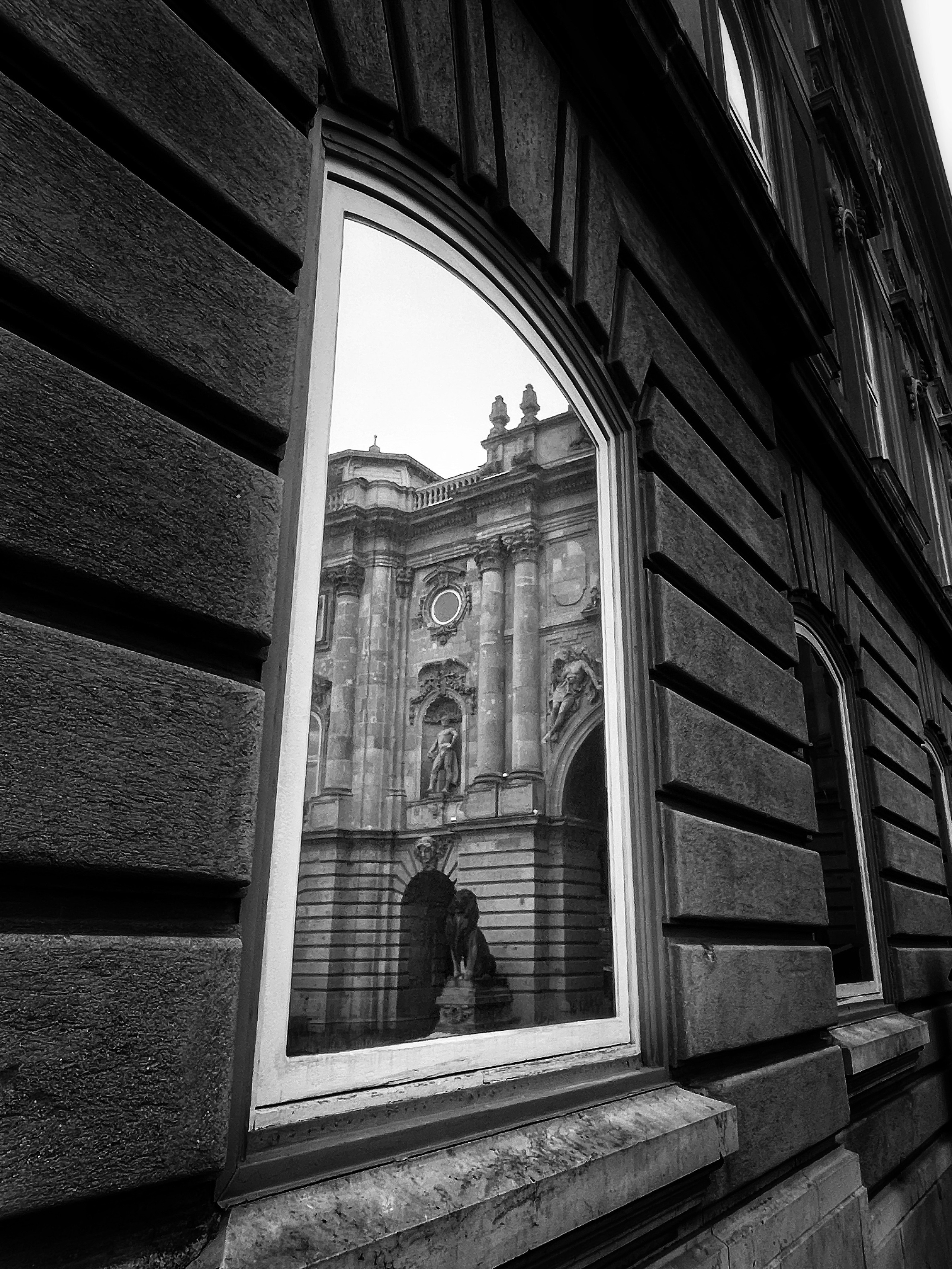 eflection in the window | Budapest 2026 | IPHONE 12 PRO
