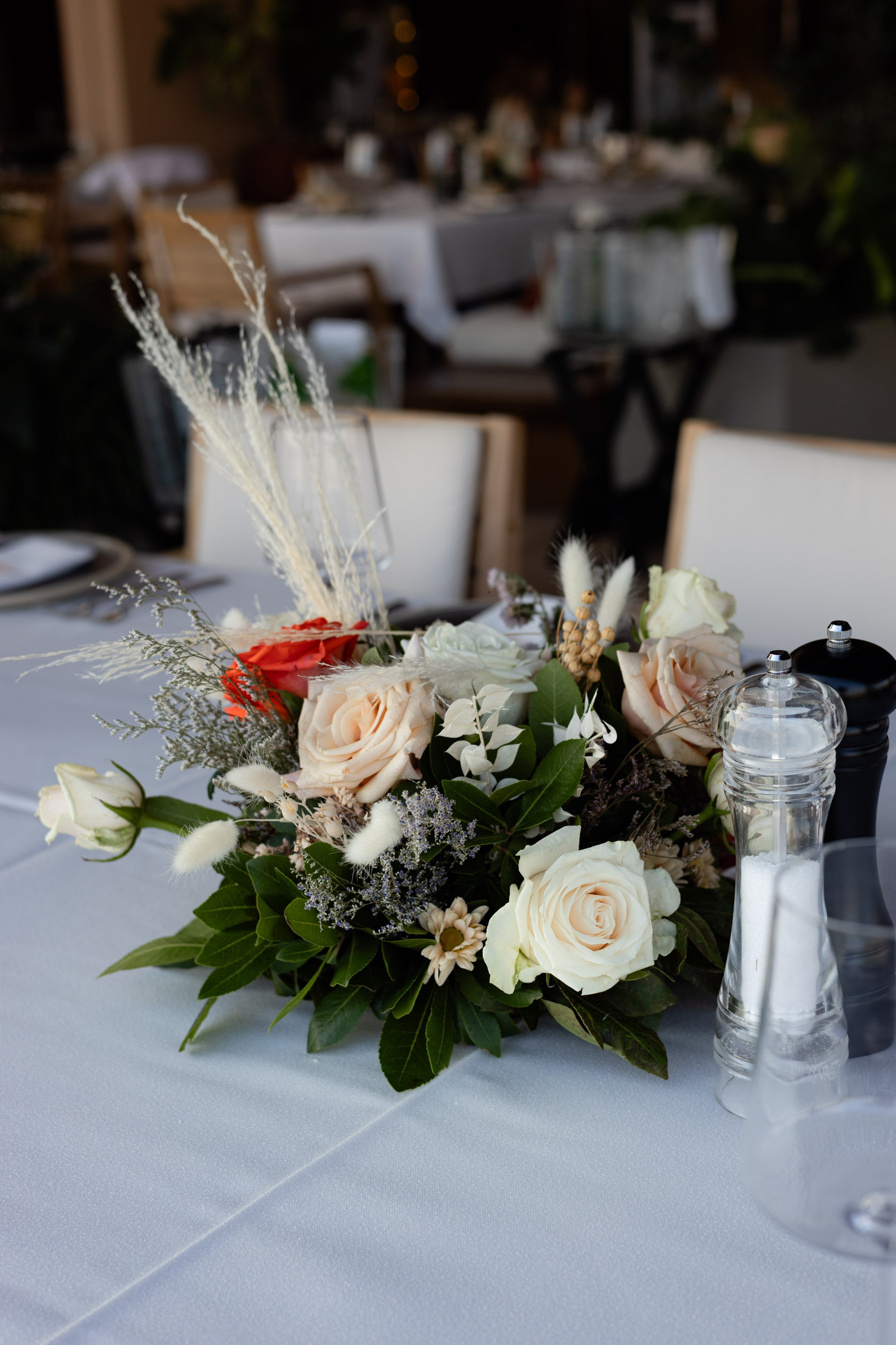 Wedding table decoration with white flowers