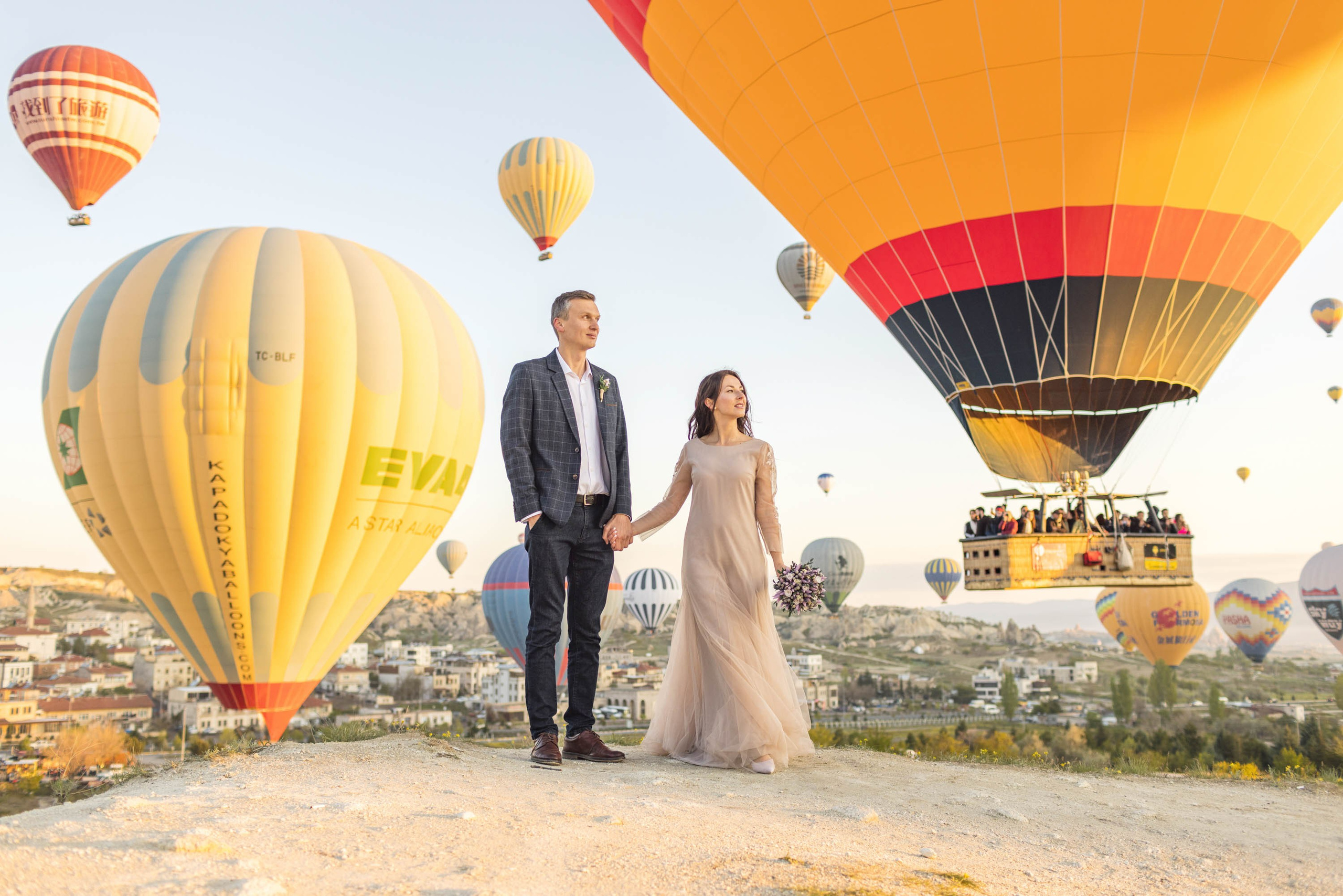 Magical Wedding Photoshoot in Cappadocia: Balloons, Caves, and Valleys. Julia Ganch I Fashion Wedding Photography I Cappadocia Turkey