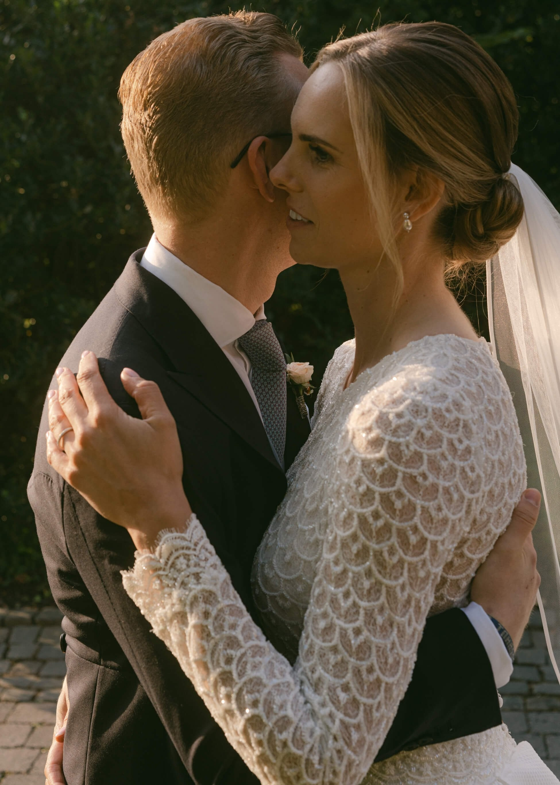 Bride and groom intimate close portrait, lace wedding dress, black tie luxury wedding Villa Rothschild Frankfurt