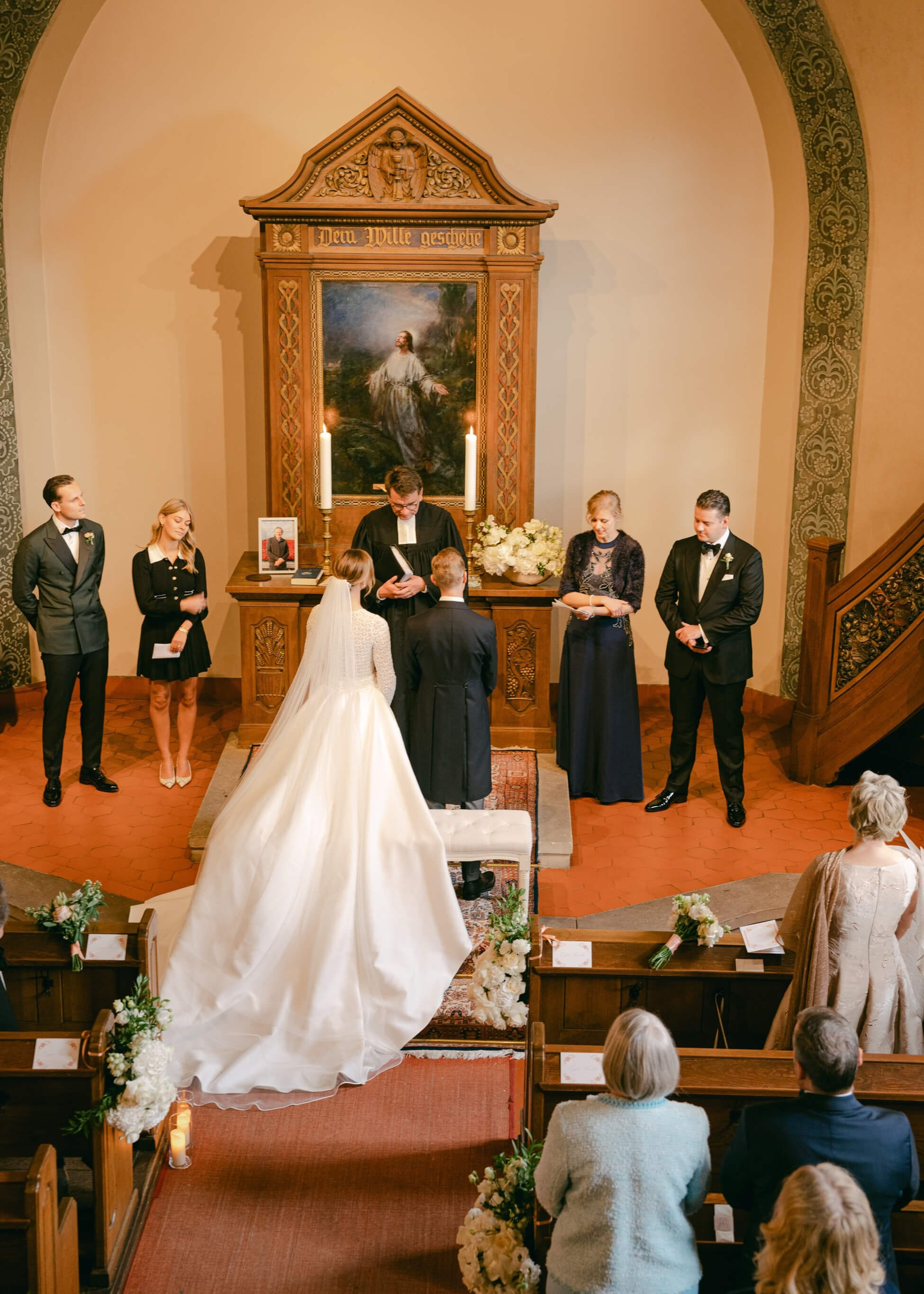 Intimate chapel blessing ceremony — bride and groom with priest and close family, luxury wedding Frankfurt Villa Rothschild