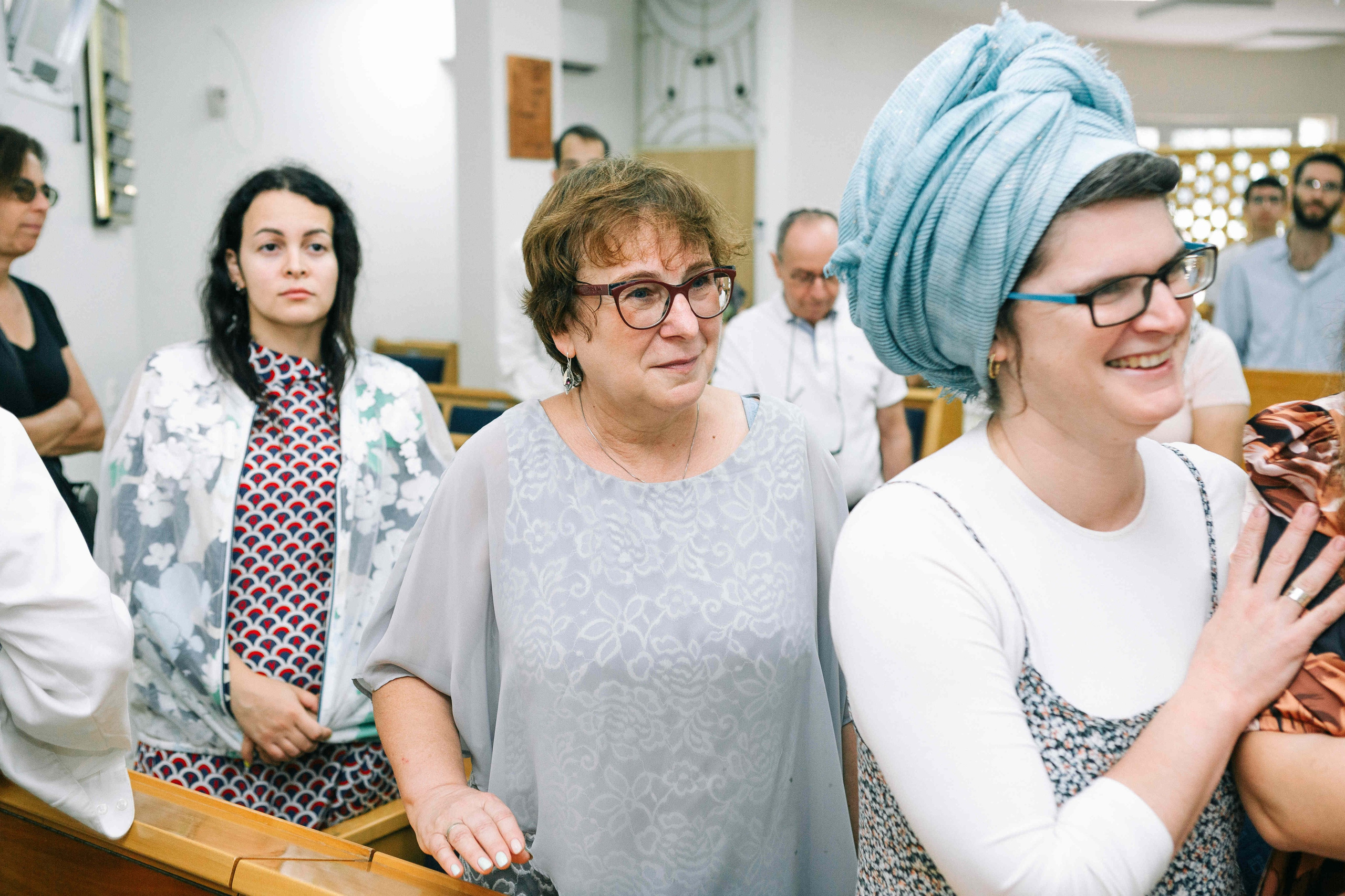 BRITH MILA IN THE SMALL SYNAGOGUE. PHOTOGRAPHER IN ISRAEL