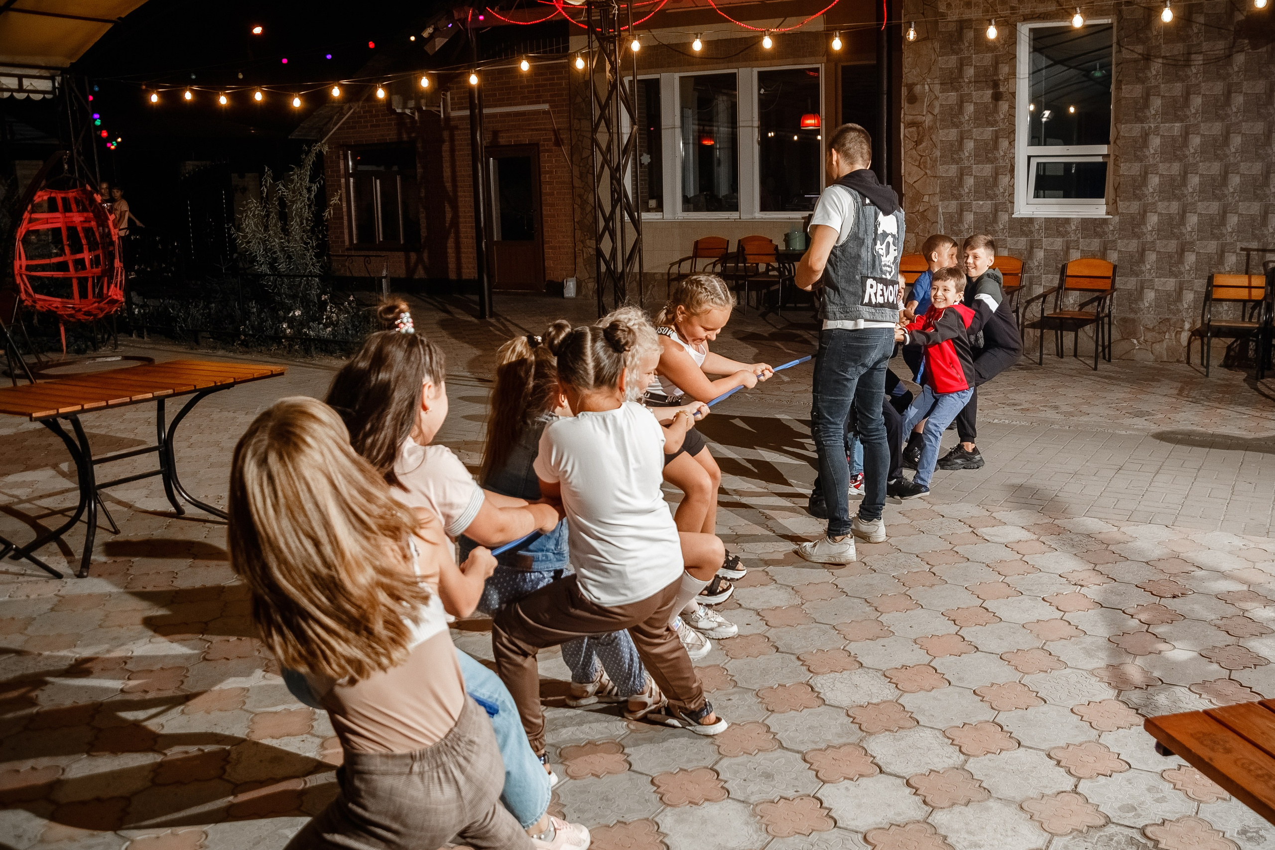 Night reportage shooting of the event with external light sources. Retoucher, color corrector, and photographer, I work remotely all over the world