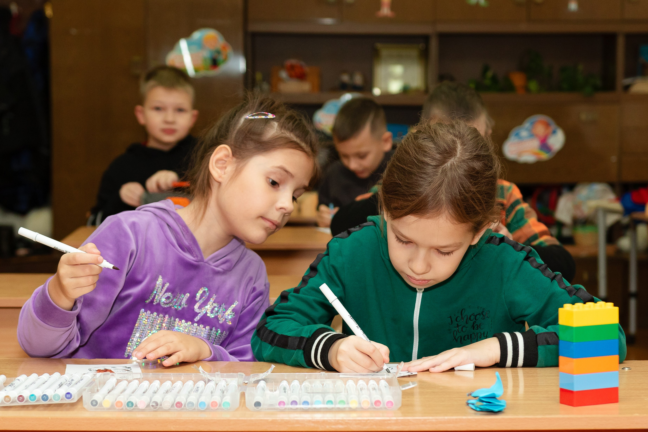 School reportage shooting indoors. Retoucher, color corrector, and photographer, I work remotely all over the world