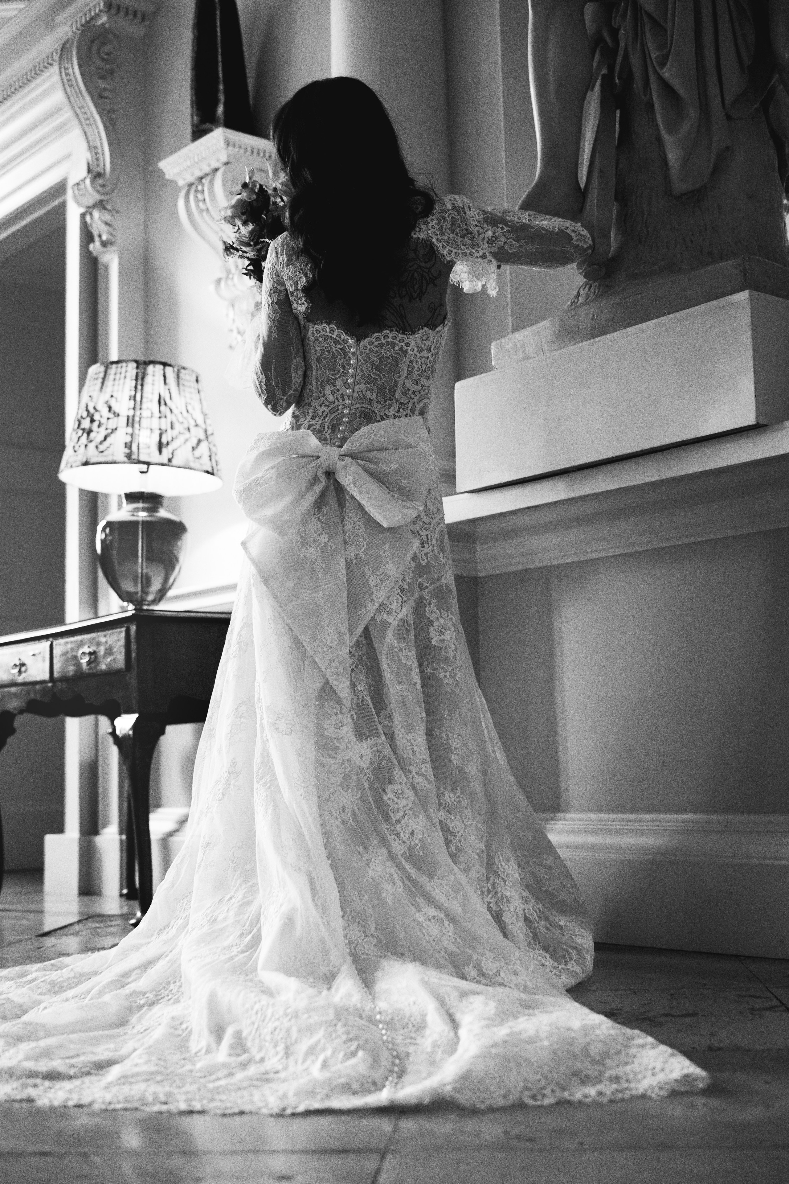 Elegant wedding portrait of bride and groom walking through the streets of ParisRomantic elopement moment captured in soft evening light in Paris, FranceLuxury wedding ceremony setup in a historic French venue with natural floralsCandid black and white photo of a couple at their city wedding in London, UKTimeless couple portrait in front of Marylebone Town Hall, LondonEditorial-style bridal preparation in a classic townhouse in the heart of LondonSoft light bridal portrait in a countryside château wedding in FranceFine art flat lay with French-inspired wedding details and vintage texturesCinematic golden hour photo at a UK estate wedding with historic architectureLuxury wedding tablescape with candles and florals at a London reception