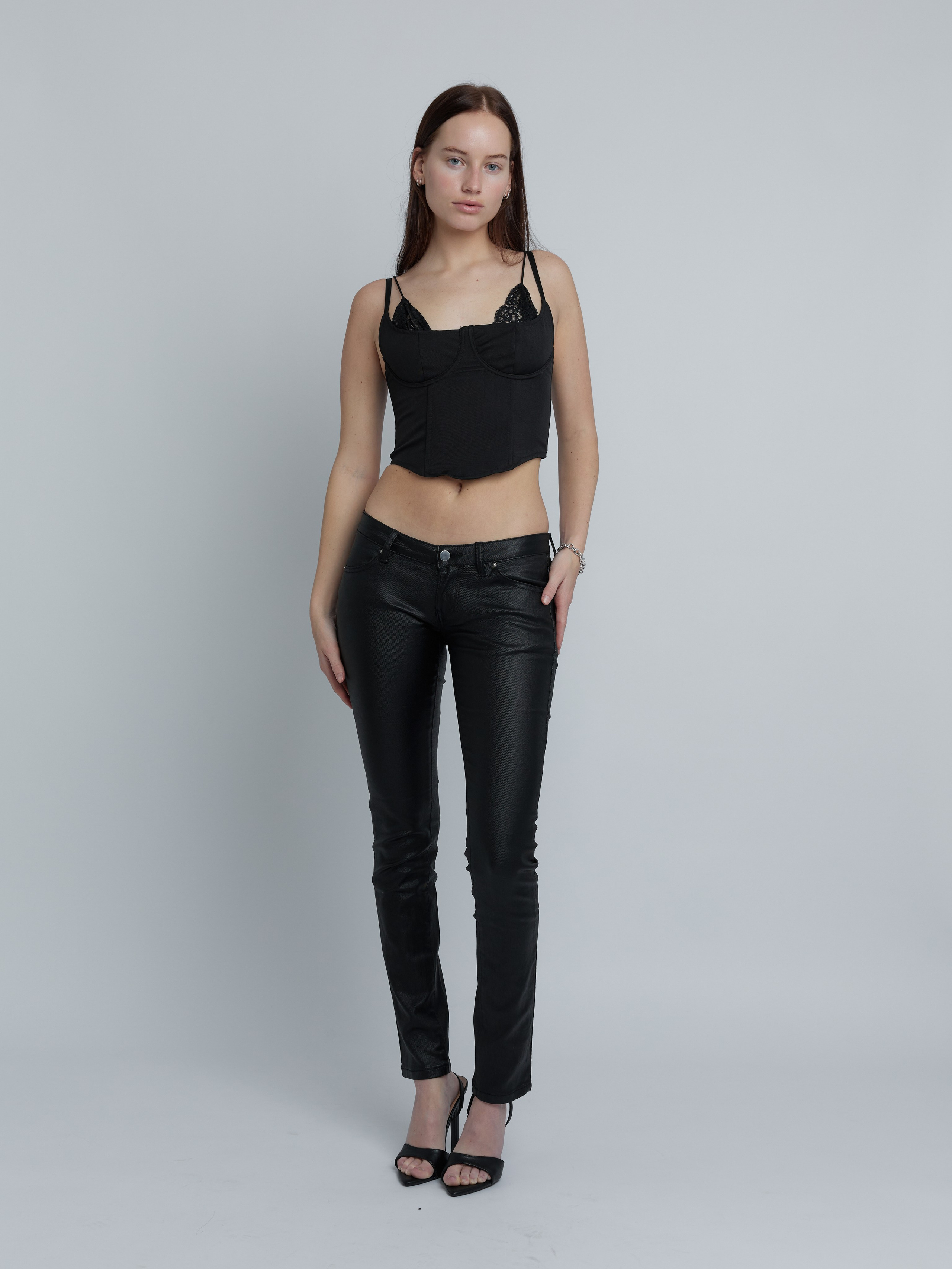 Full-length female model digital on neutral studio background