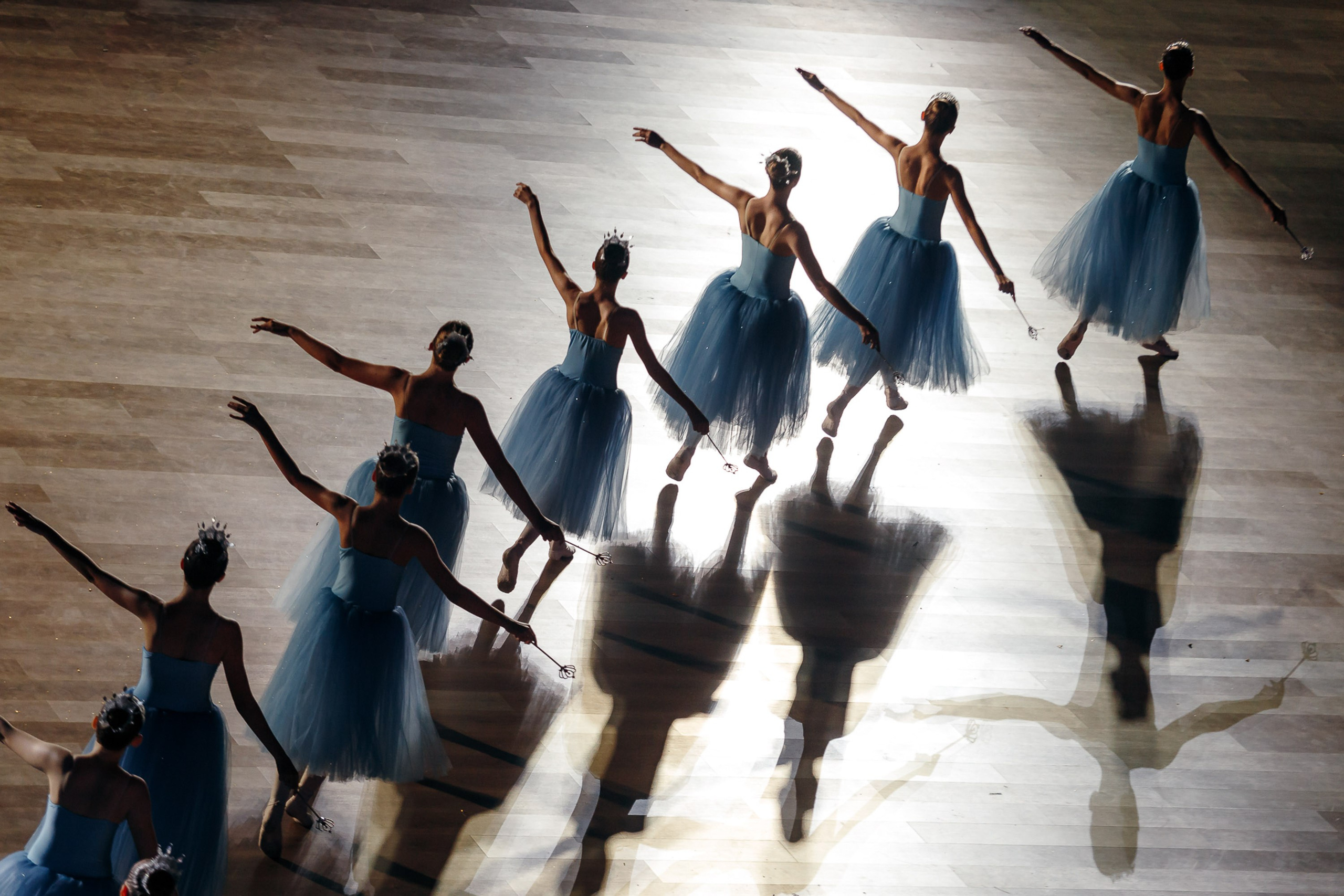 Guests dancing in line formation, joyful party moment