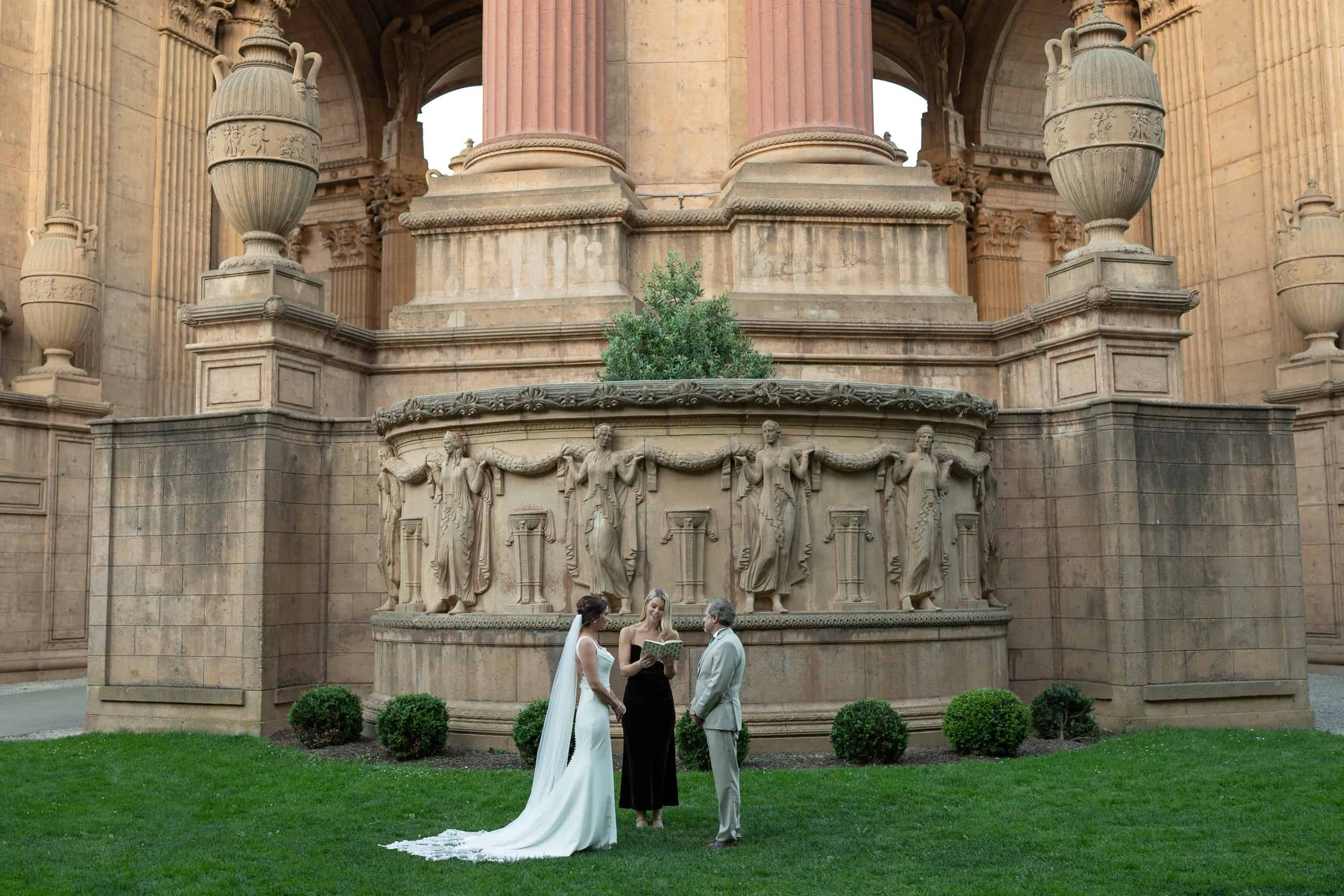 Elopement ceremony during sunset time at Palace of Fine Arts