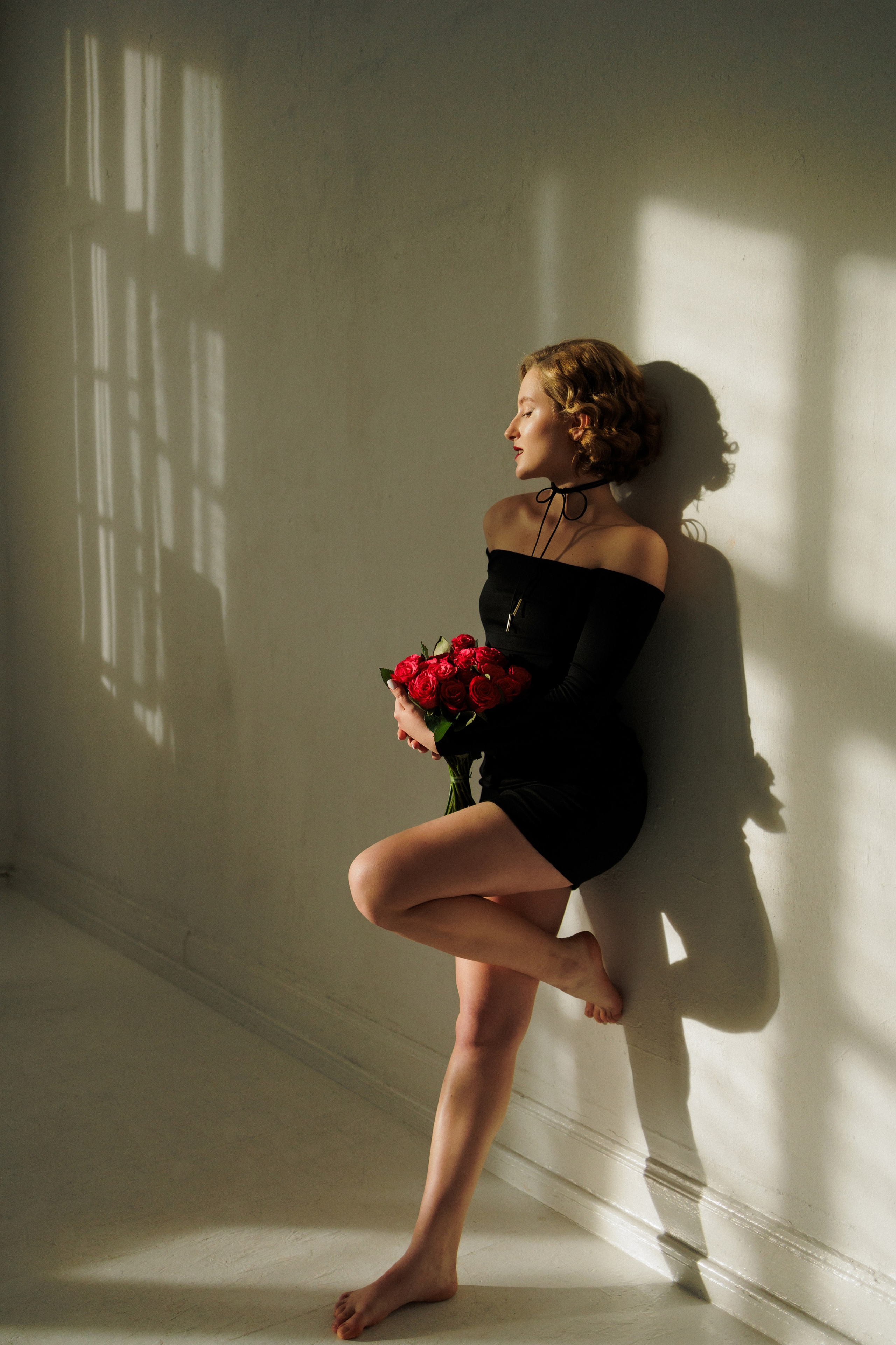 Soulful Studio Portrait. Woman in a Black Dress with Red Roses. Kristina Kozheltsova- Soulful Portrait&Lifestyle&Love Story Photographer in Leipzig, Germany