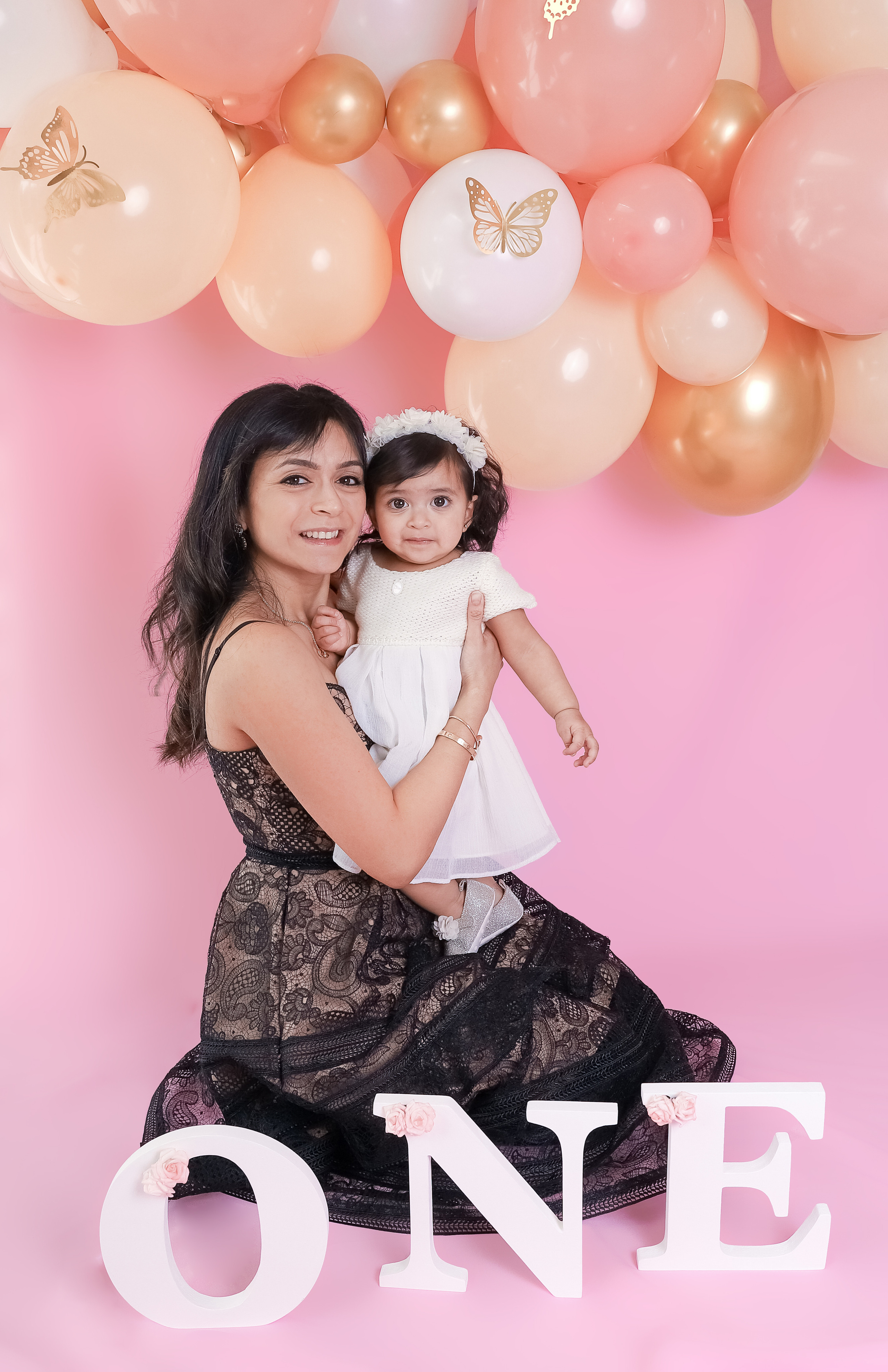 Pink backdrop. Family & children’s photographer in Herts & West London Iryna Blair