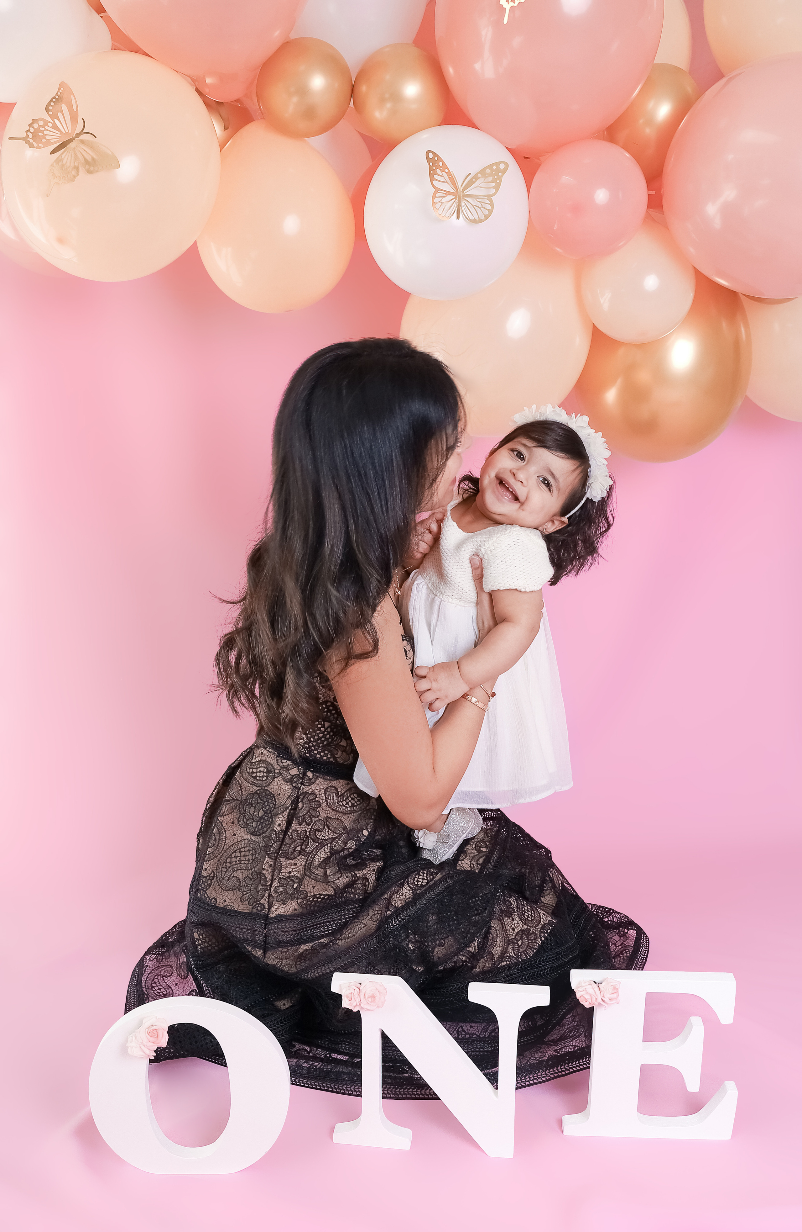 Pink backdrop. Family & children’s photographer in Herts & West London Iryna Blair