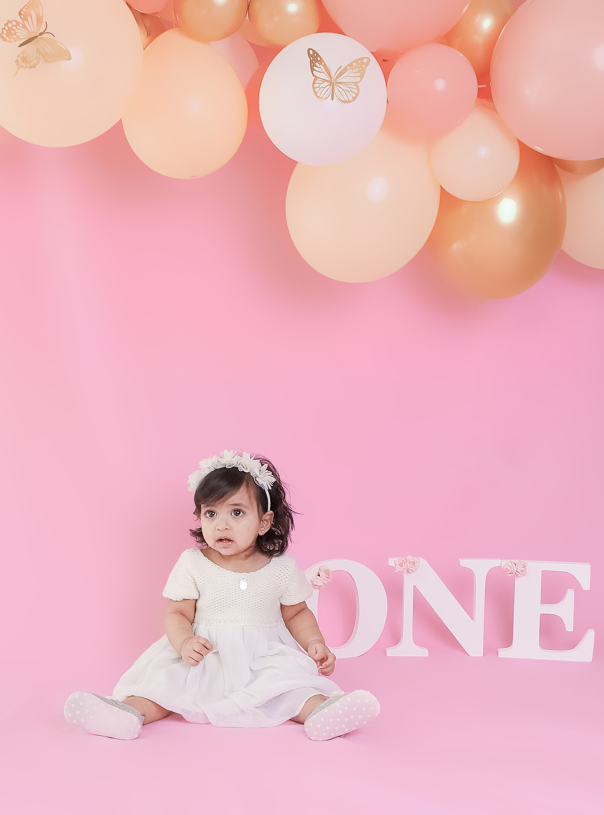 Pink backdrop. Family & children’s photographer in Herts & West London Iryna Blair
