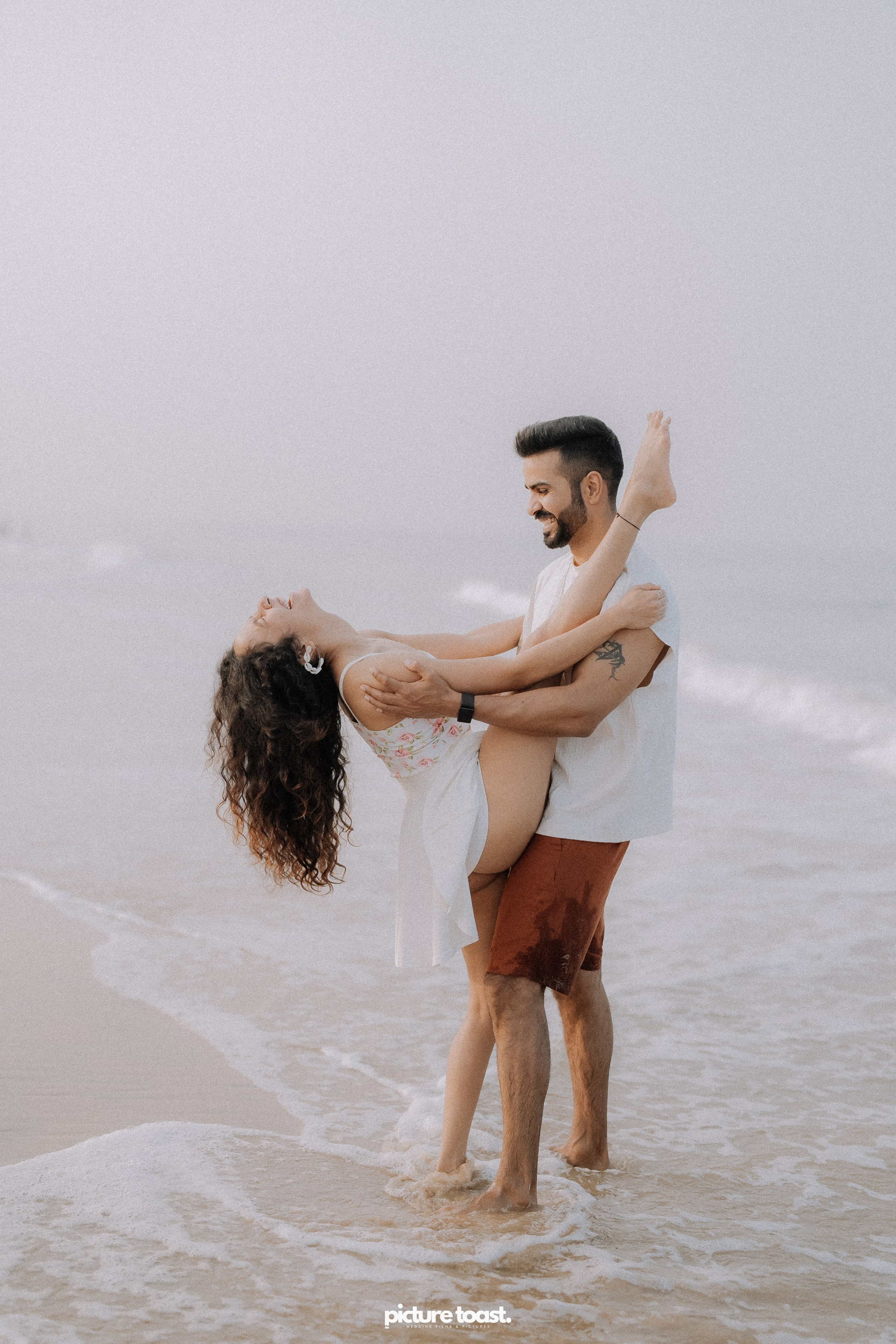 Love In The Beach. Fine art Wedding Photographers in India & Canada