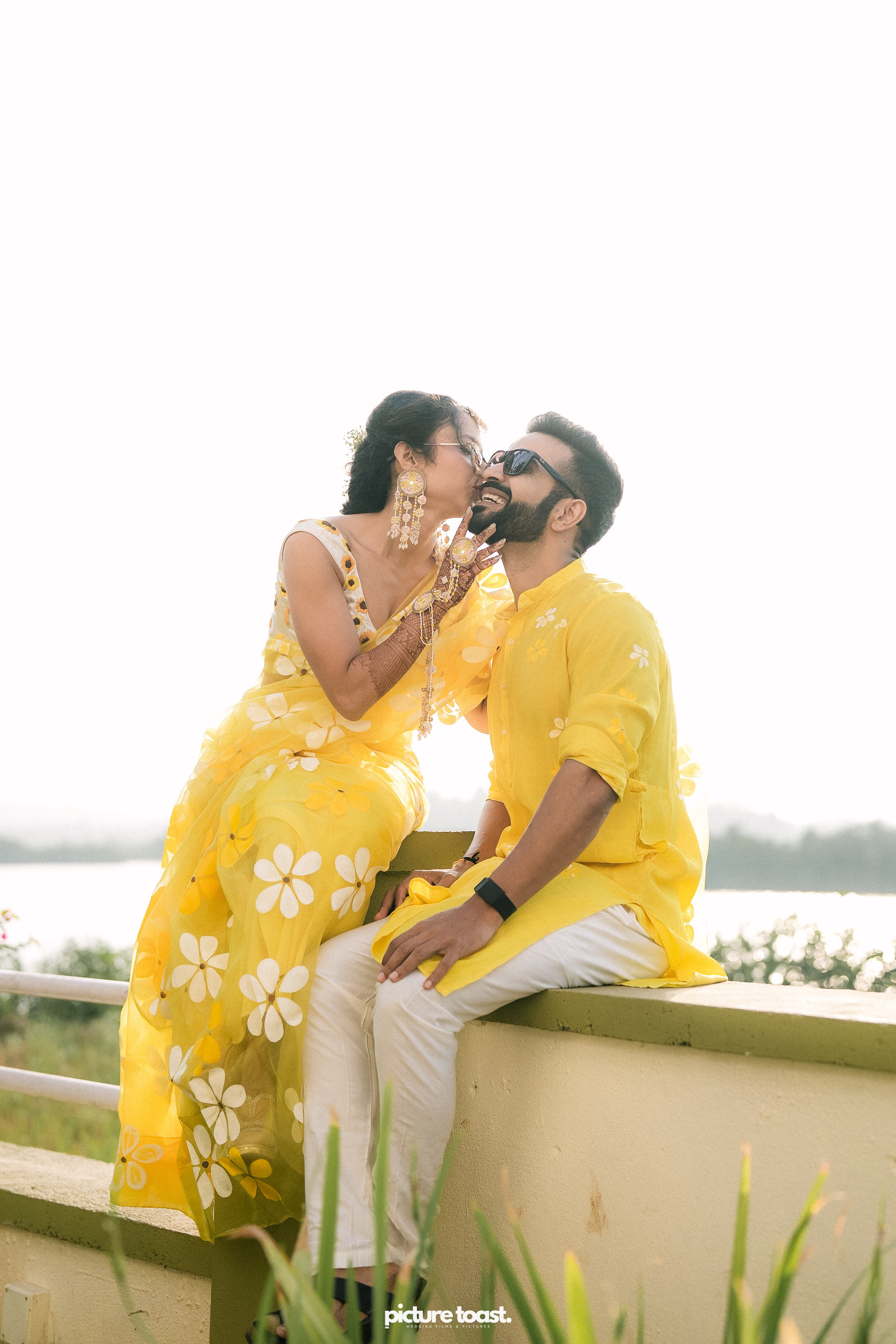 Haldi Hues Ft. Baebie & Goyal. Fine art Wedding Photographers in India & Canada