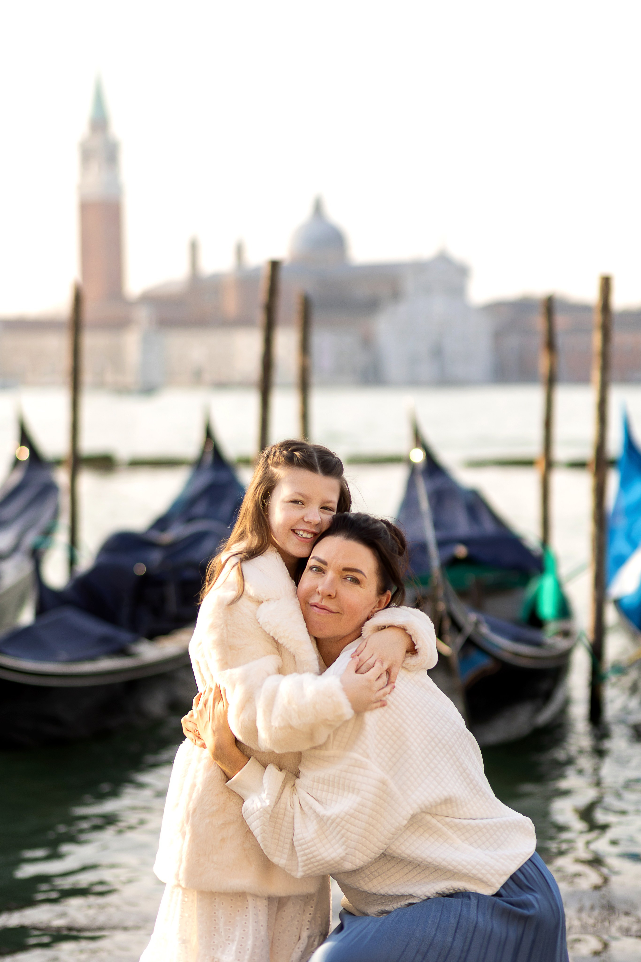 Mother and daughter at sunrise