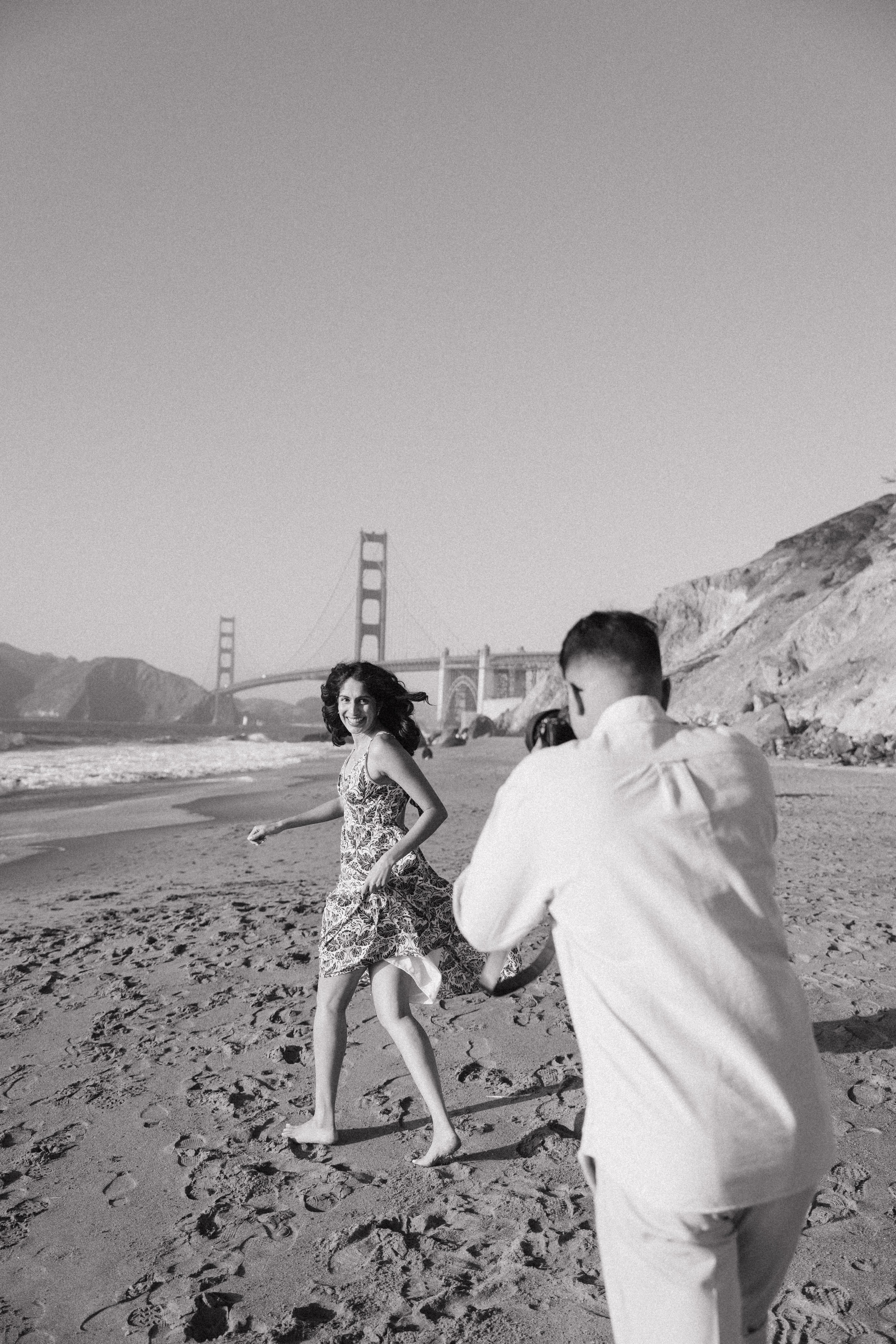 Engagement and Couple’s Photoshoot at Marshall’s Beach with iconic Golden Gate bridge view. Soulo Photography | San Francisco Bay Area Based Photographer