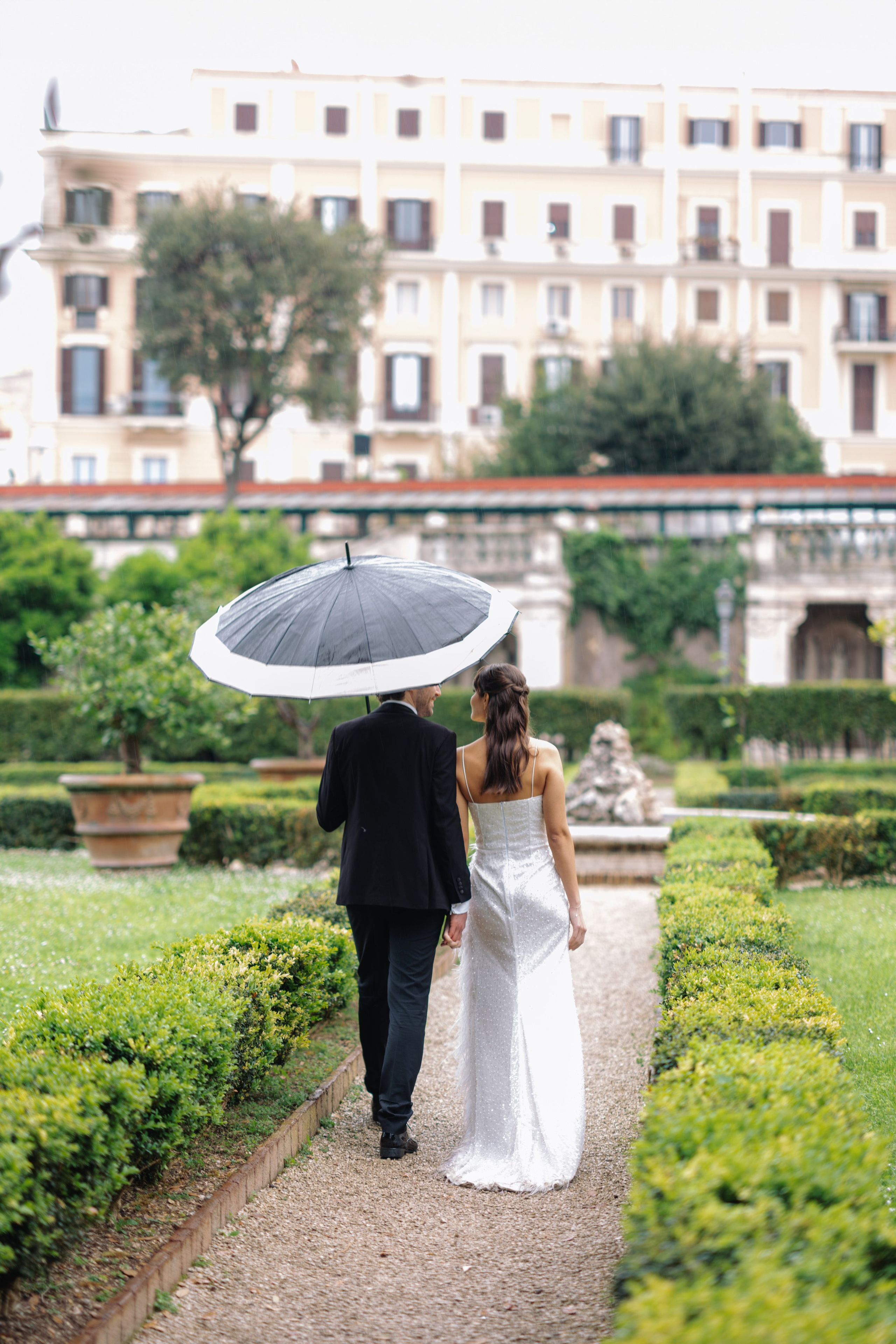 A Romantic Sunrise Elopement in Rome — Rain, Vespa & Love