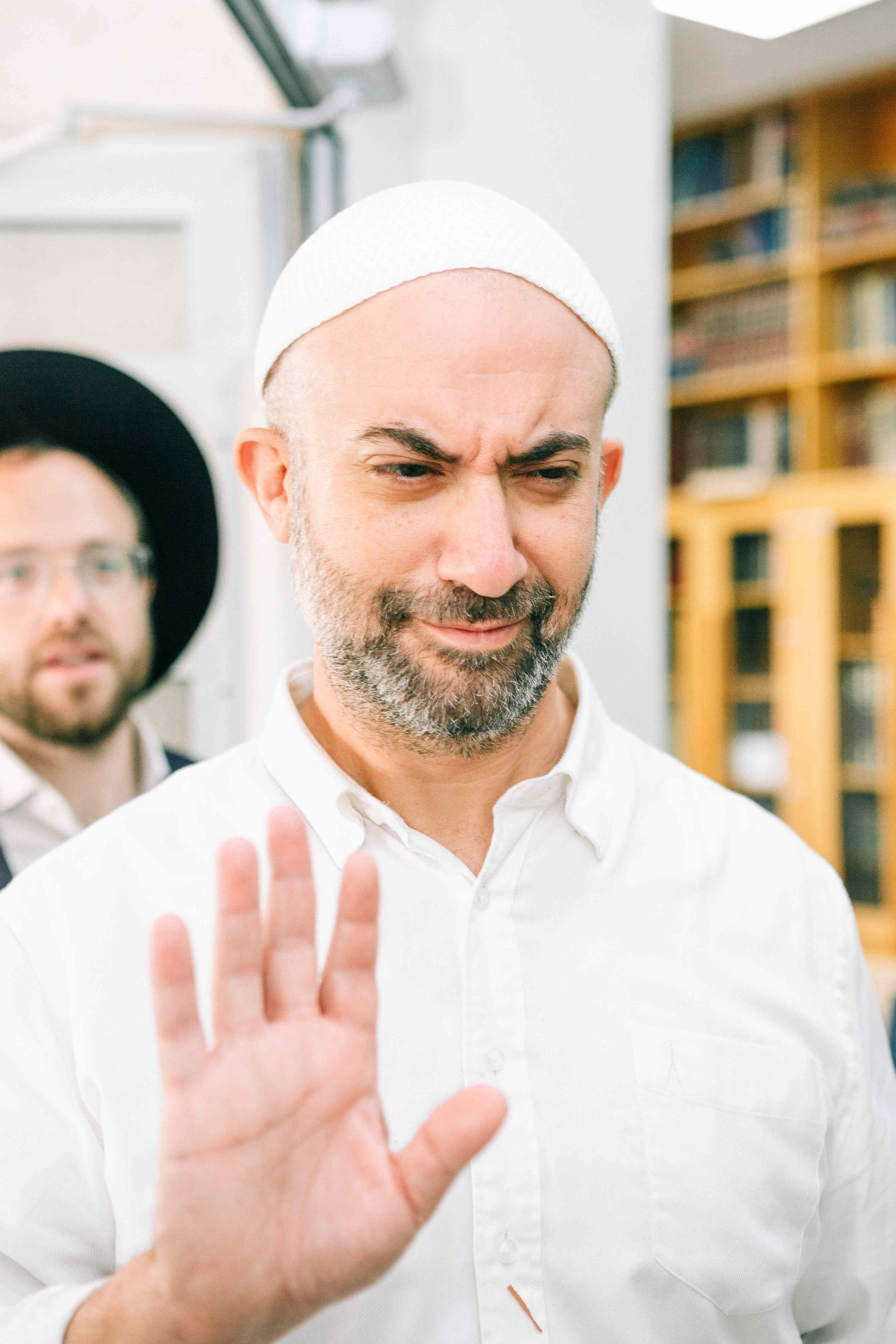 BRITH MILA IN THE SMALL SYNAGOGUE. PHOTOGRAPHER IN ISRAEL