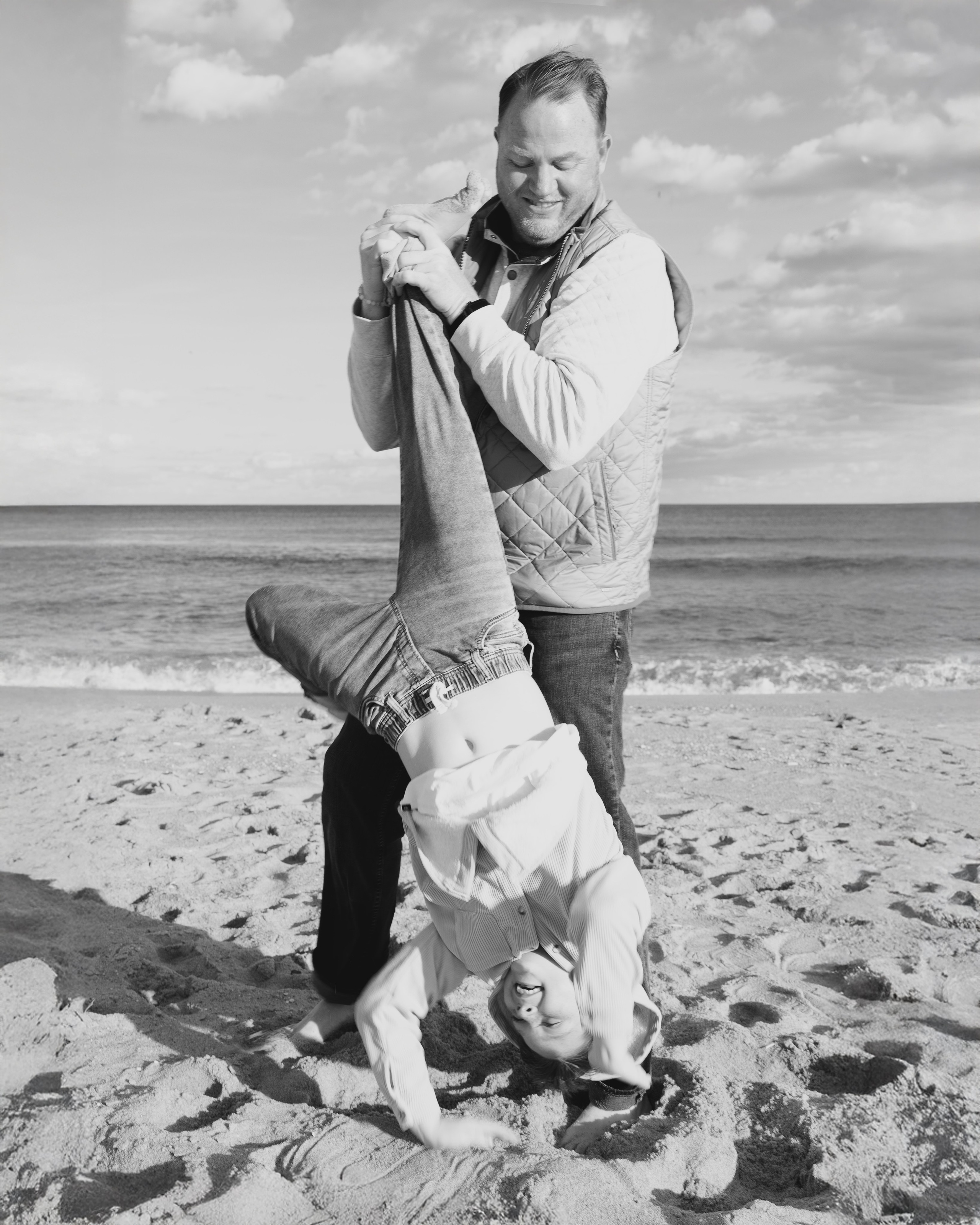 Sun, Sand, and Family Hugs. Family, lifestyle, and commercial photography in New York and New Jersey