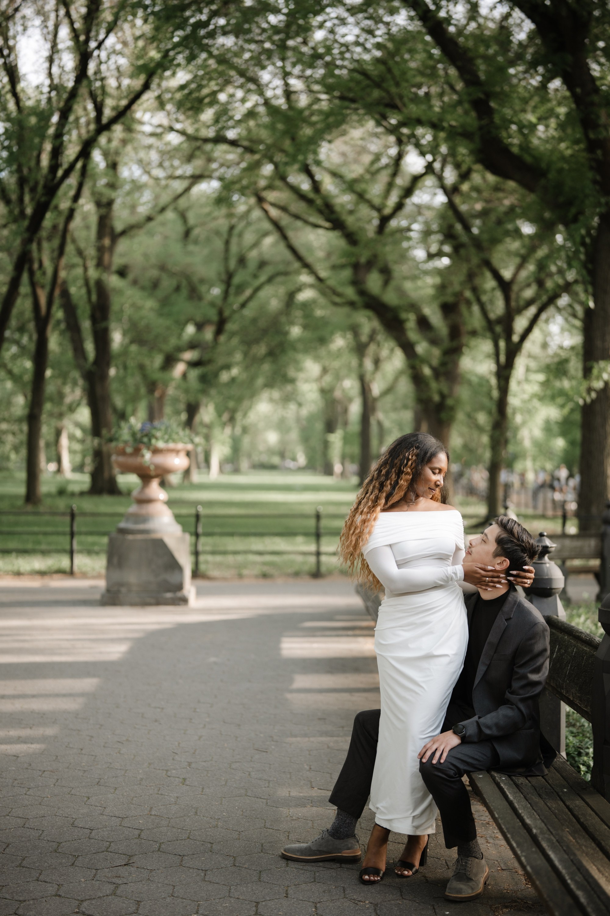 Engagement photo shoot in Central Park in spring. Portrait and wedding photographer in New York