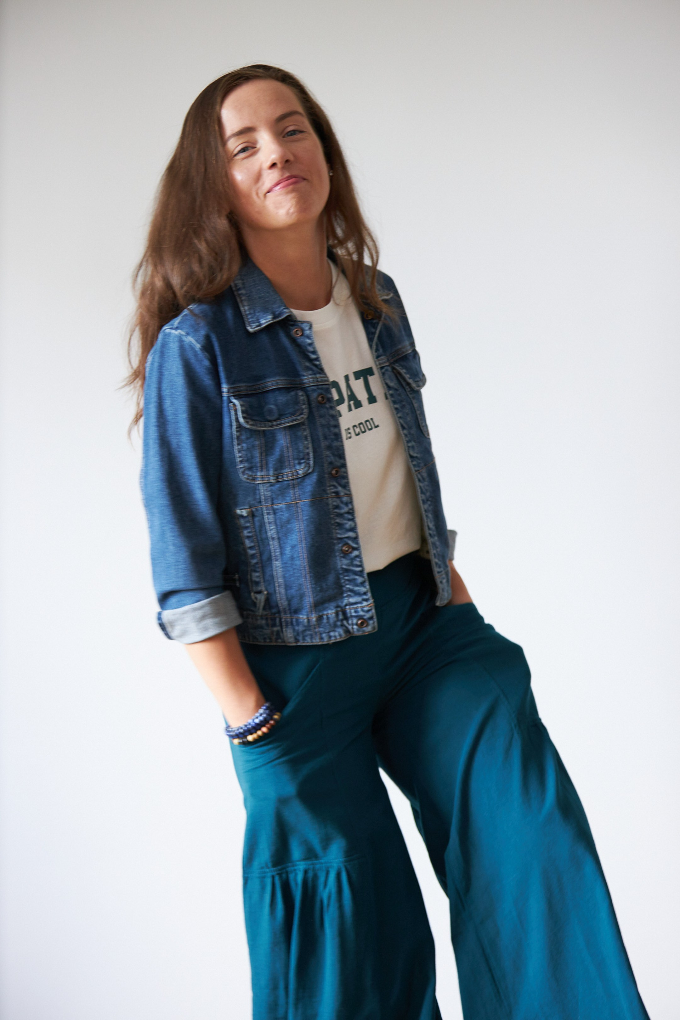 Emotional portrait of a young lady on a white studio background - - photographer Andrey Dunin