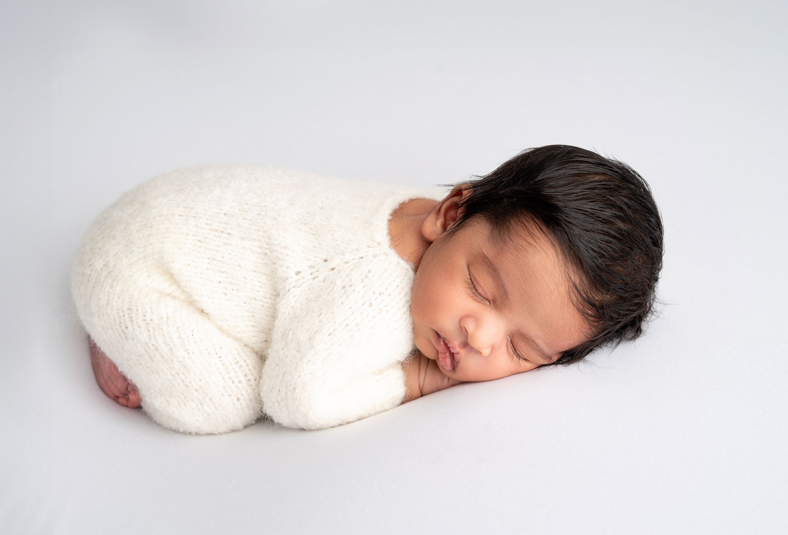 NEWBORN PORTFOLIO. Newborn Photographer and life casting in Dubai Dariya Saeed