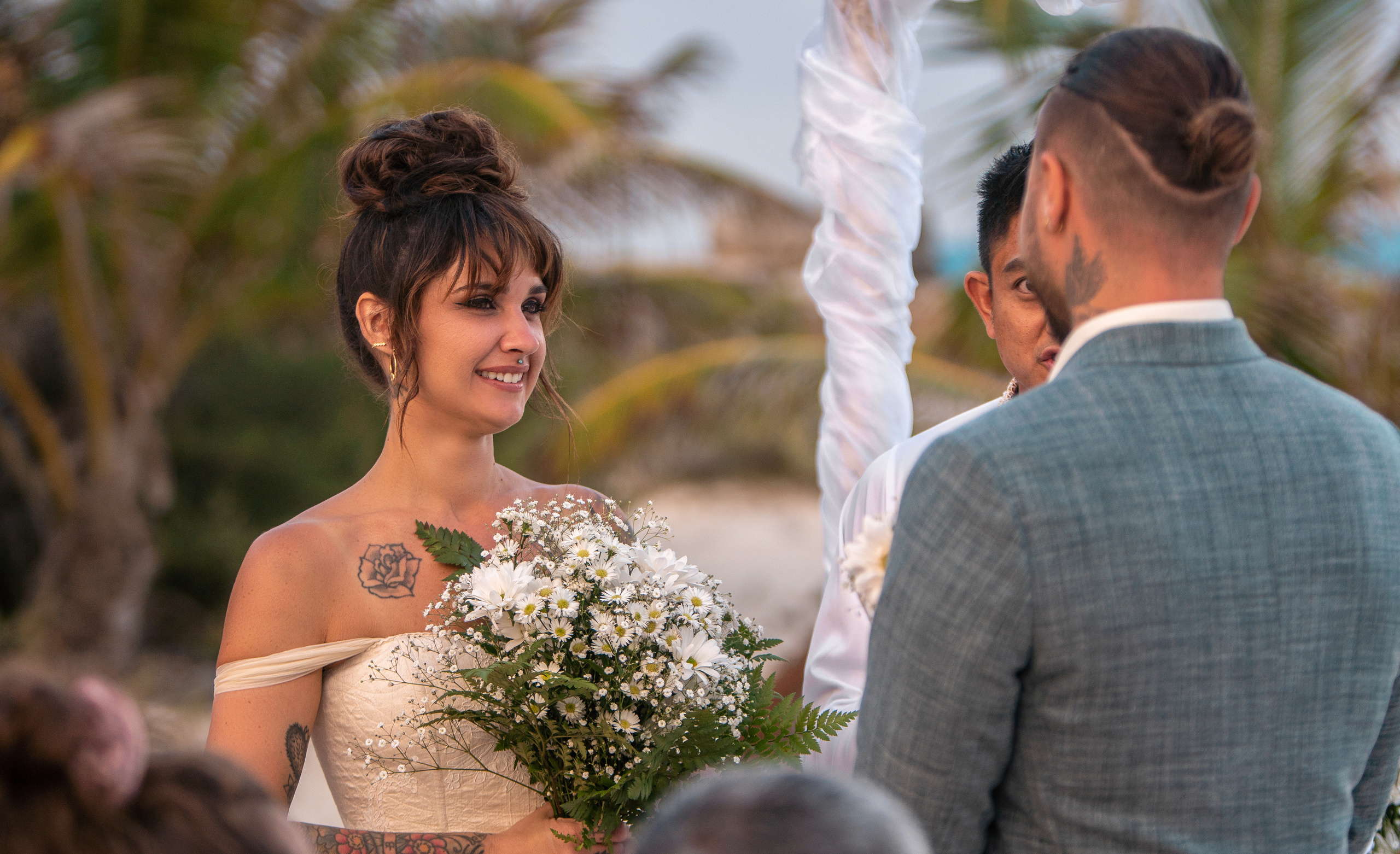 Bride looking at groom during intimate ceremony