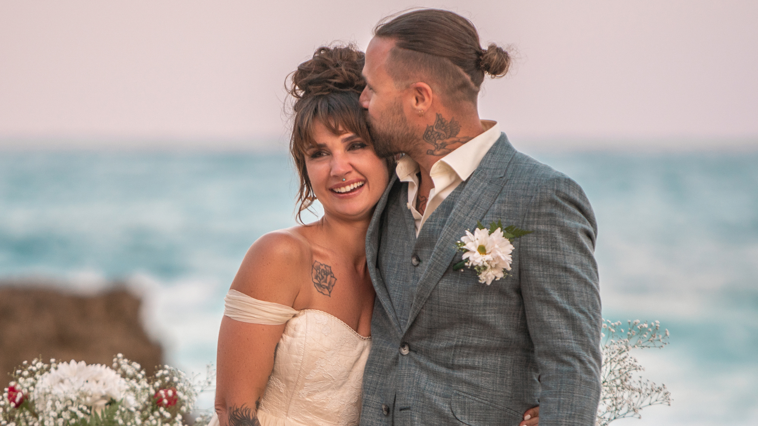 Classic outdoor ceremony setup with white florals