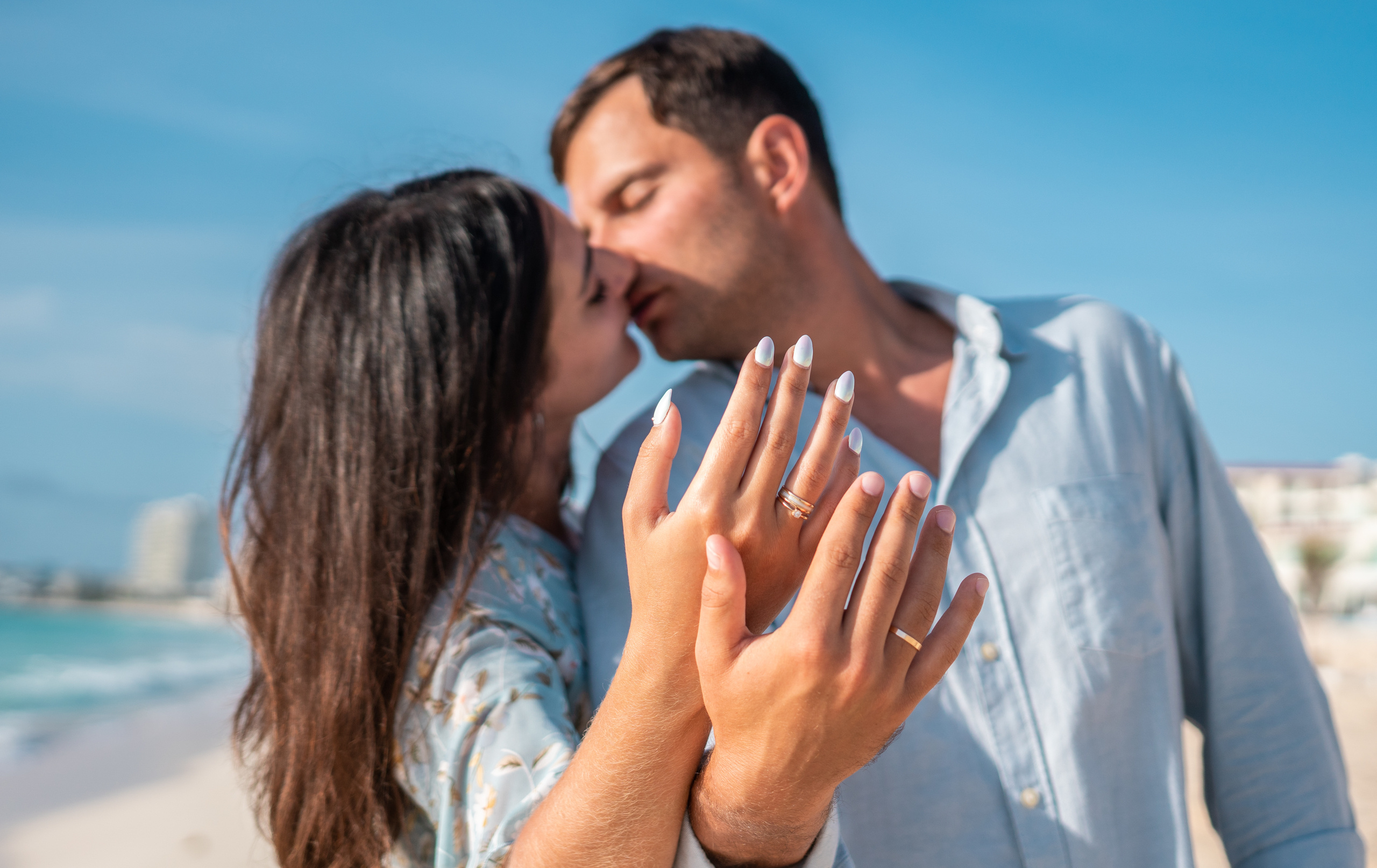 Intimate couple kiss in tropical Mexico. Authentic wedding photography Mexico Cancun