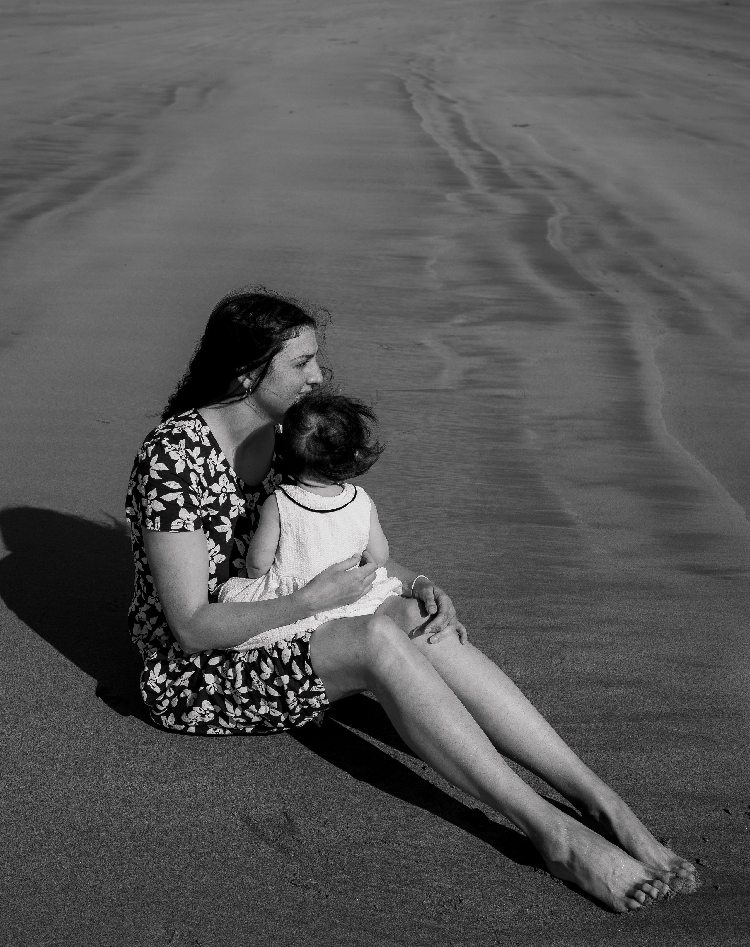 Darya and Mia at the ocean. Wedding and family photographer Ireland