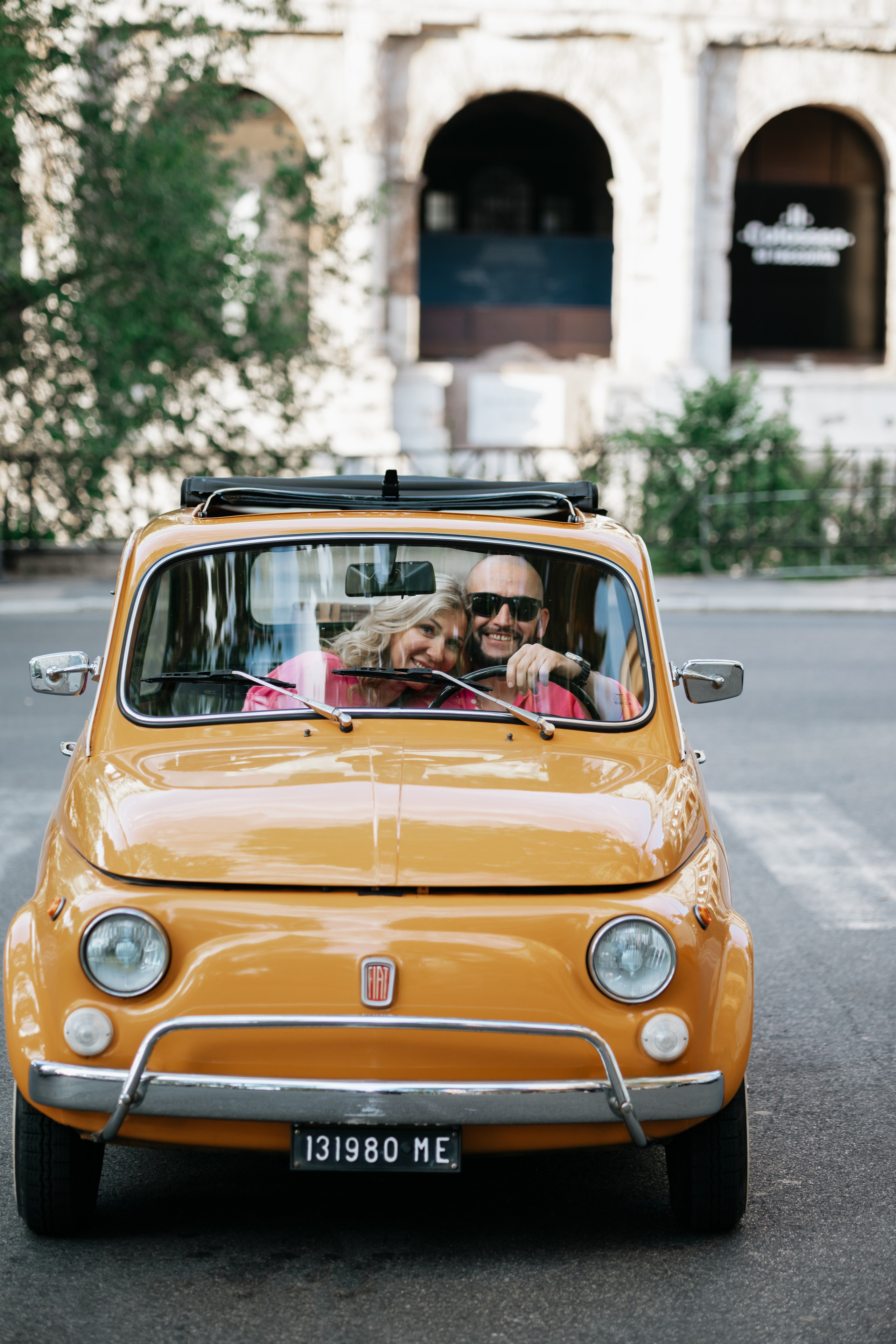 Fiat 500 and Vespa. Photographer in Rome