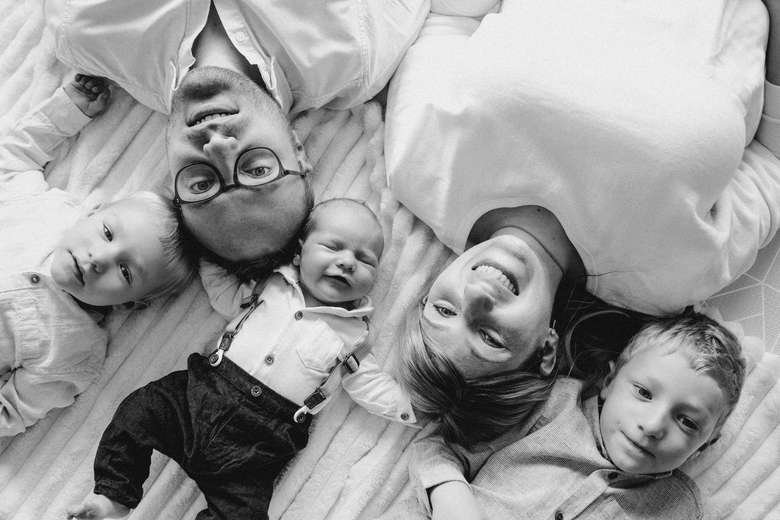 Natural newborn photography at home in Solihull, soft and timeless family portraits.