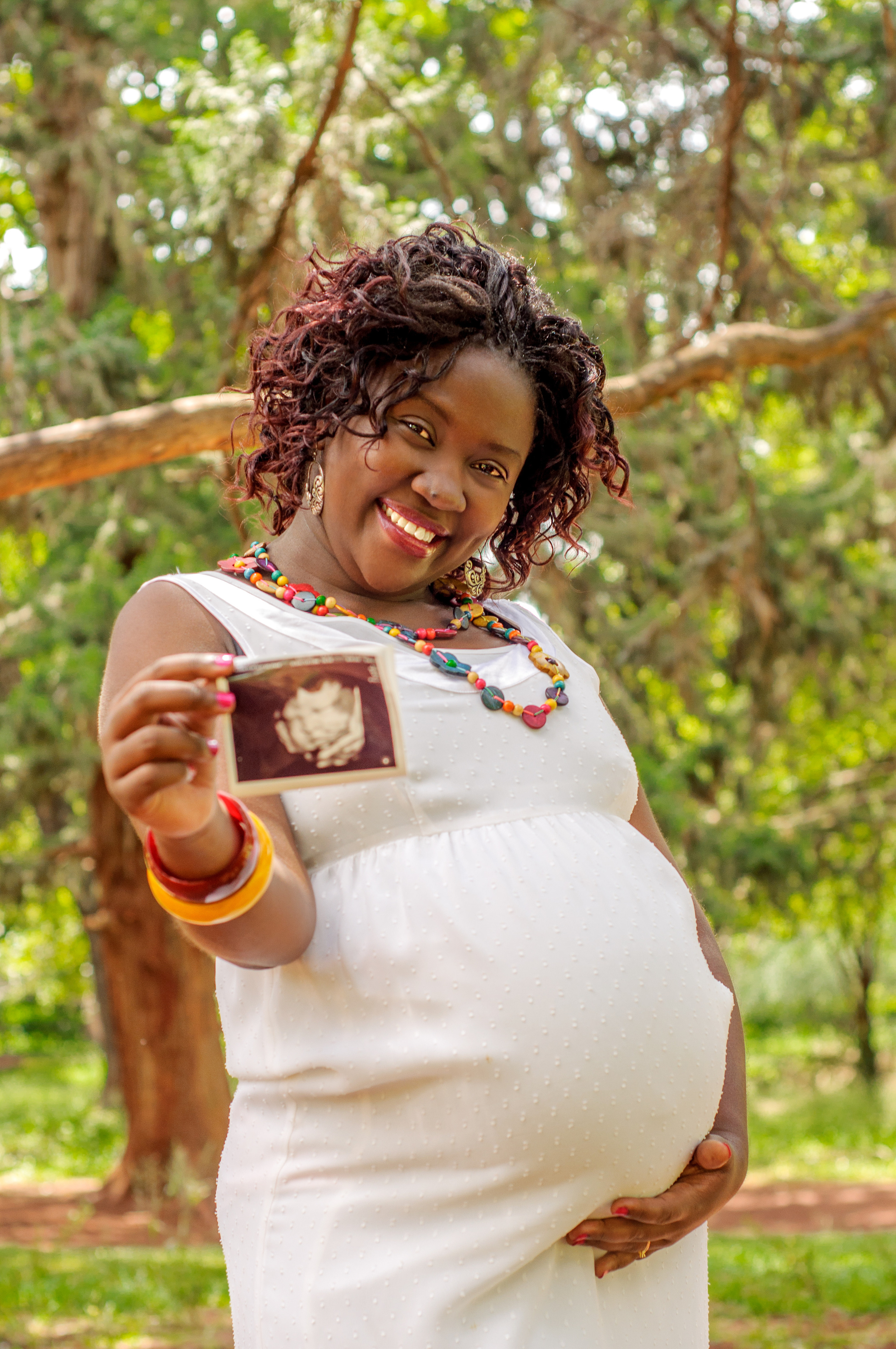 Amazing black preggy woman in stylish dress photo shoot Nairobi Kisumu Kenya 