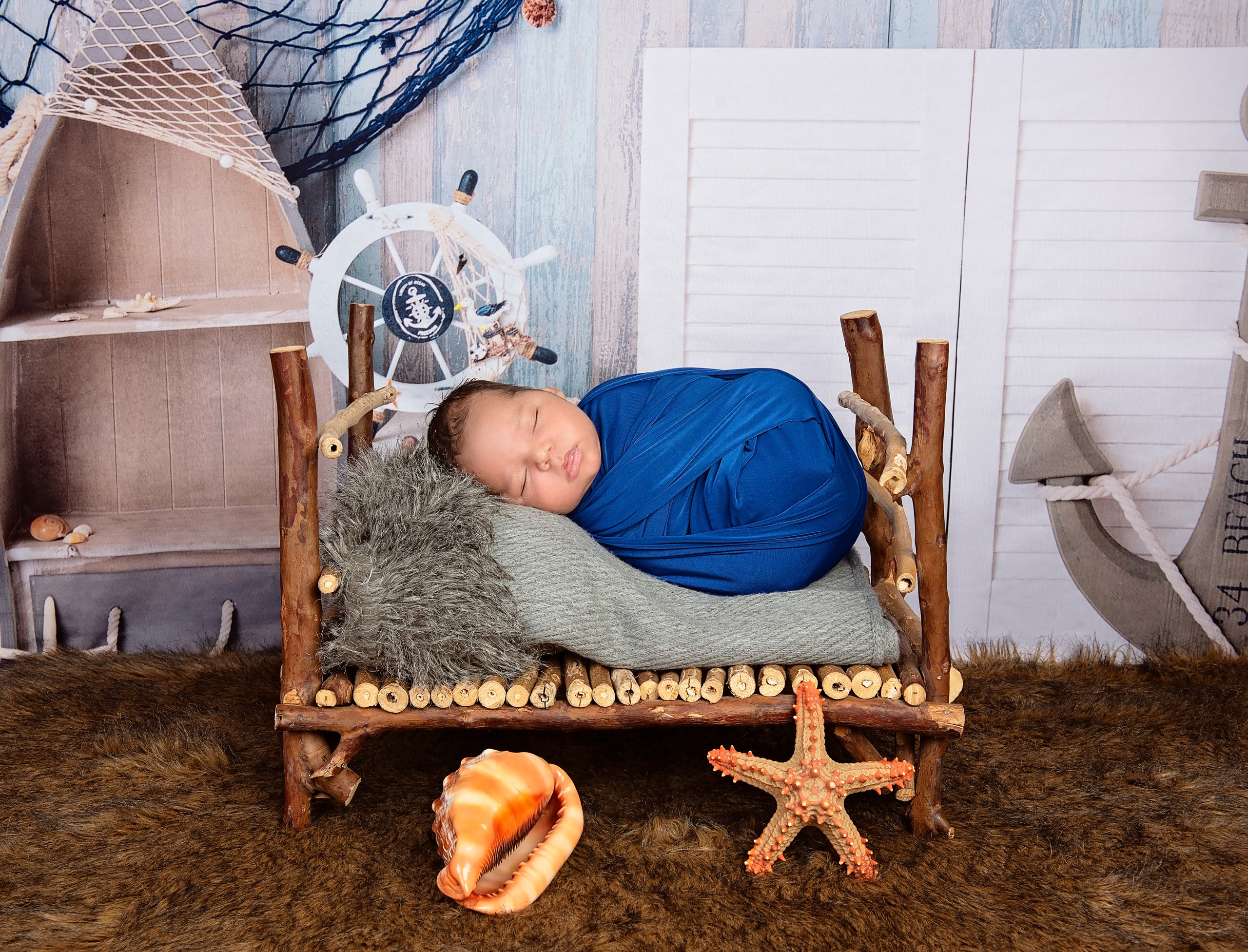 Amazing wrapped baby boy in the bed photo shoot Nairobi Mombasa Kenya