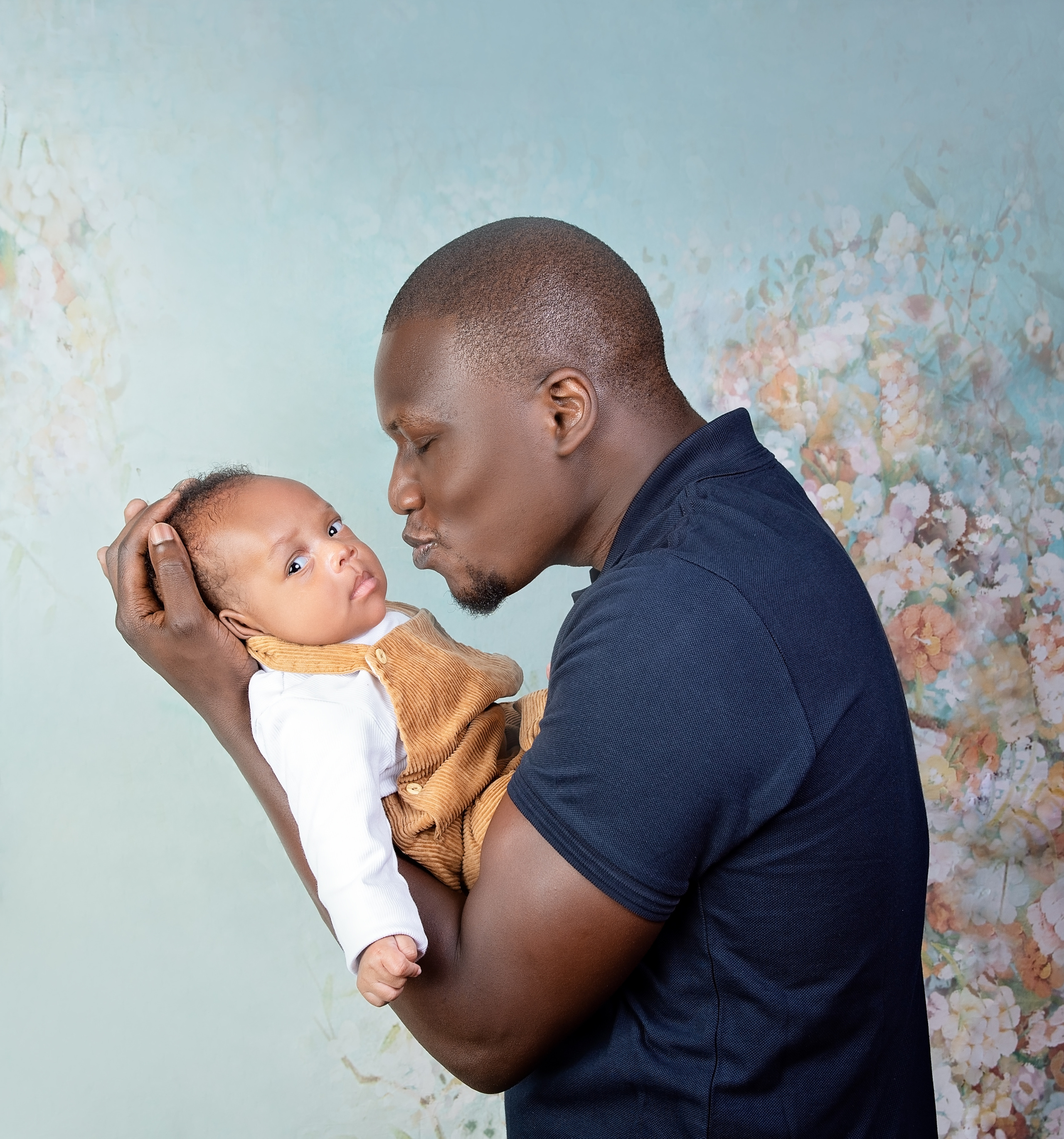 Black family photo shoot father and son baby boy Mombasa Kenya