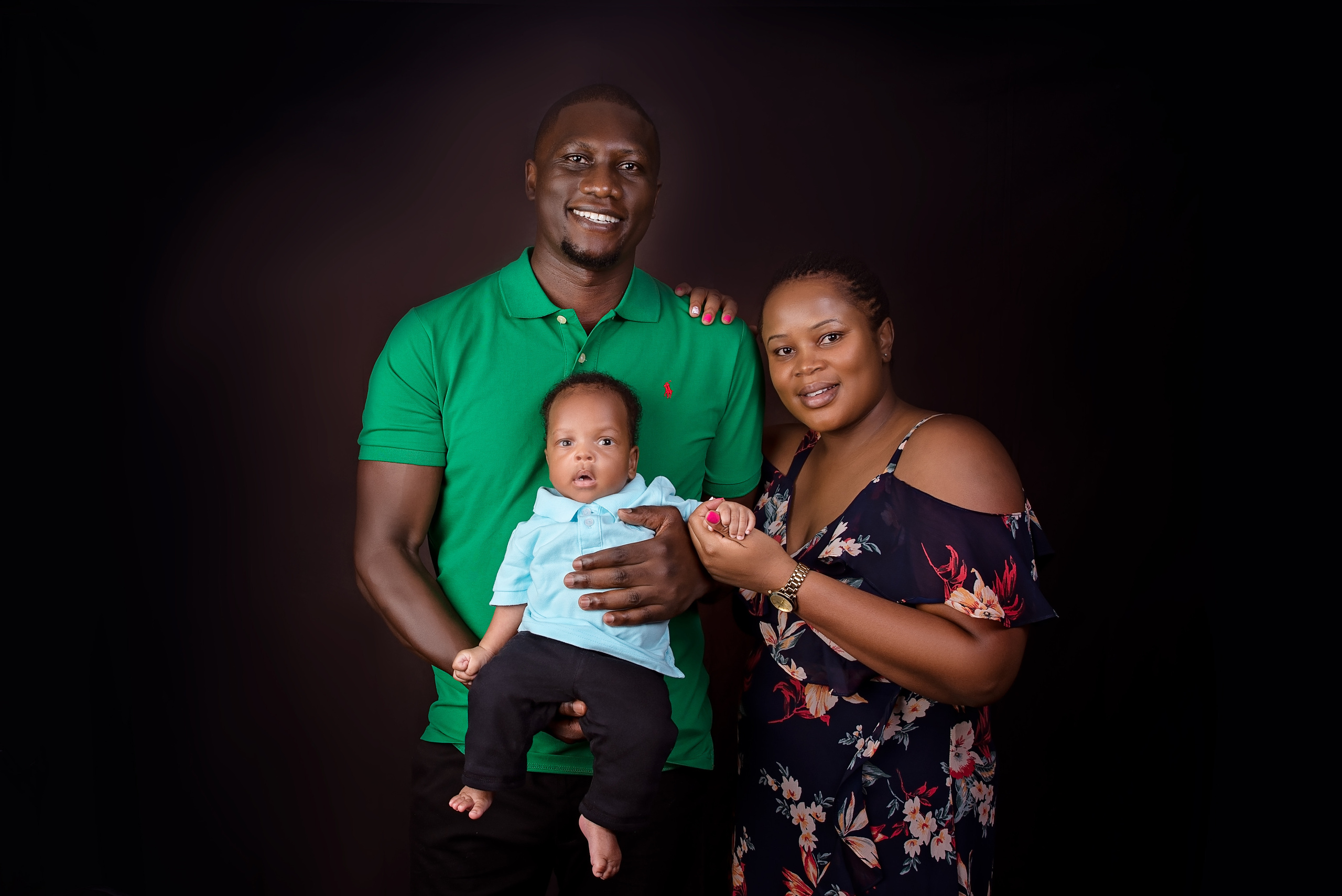 Happy Black African family father mother son photo shoot Nairobi Mombasa Kenya