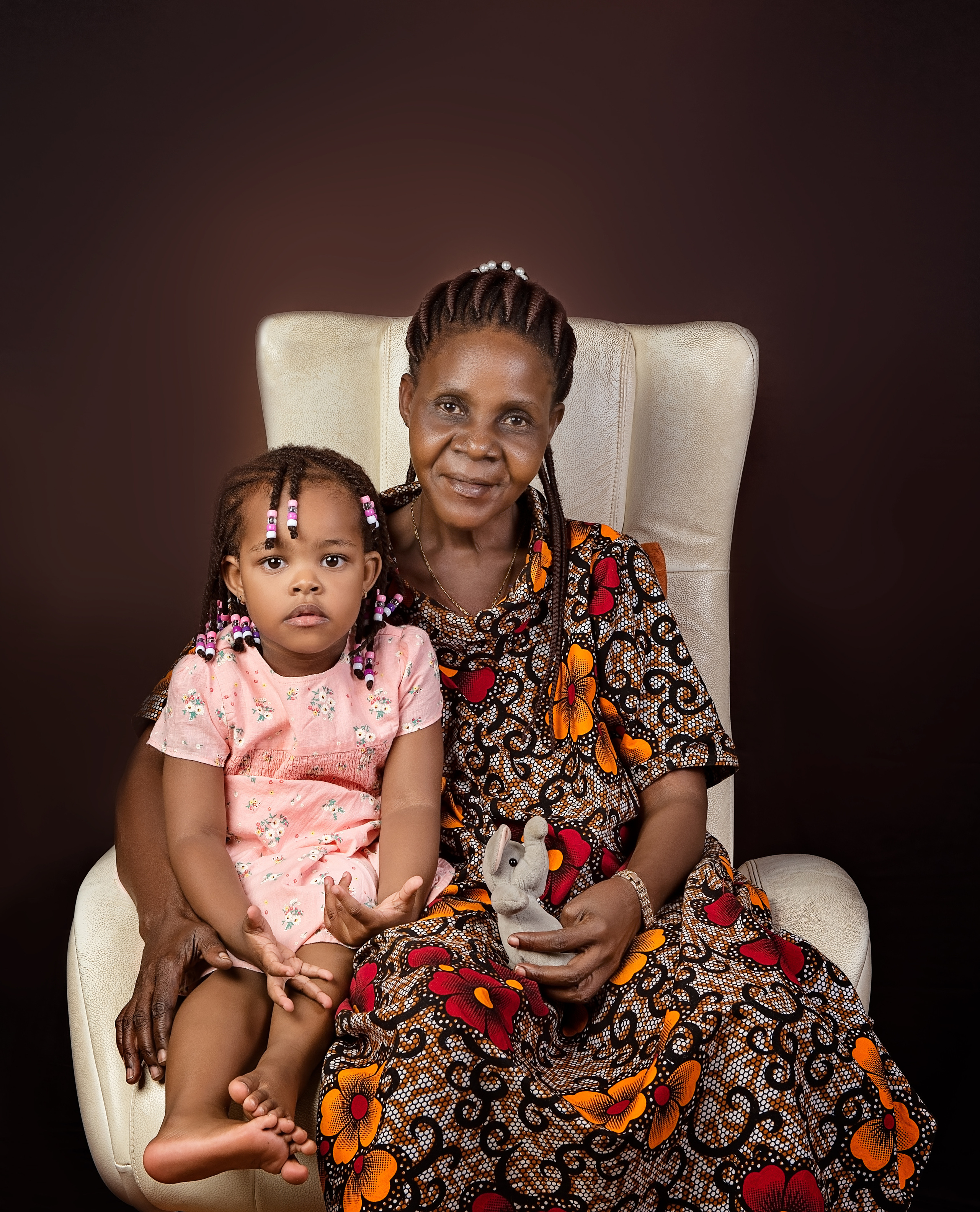 African grandmother granddaughter sitting together Nairobi Mombasa Kenya 