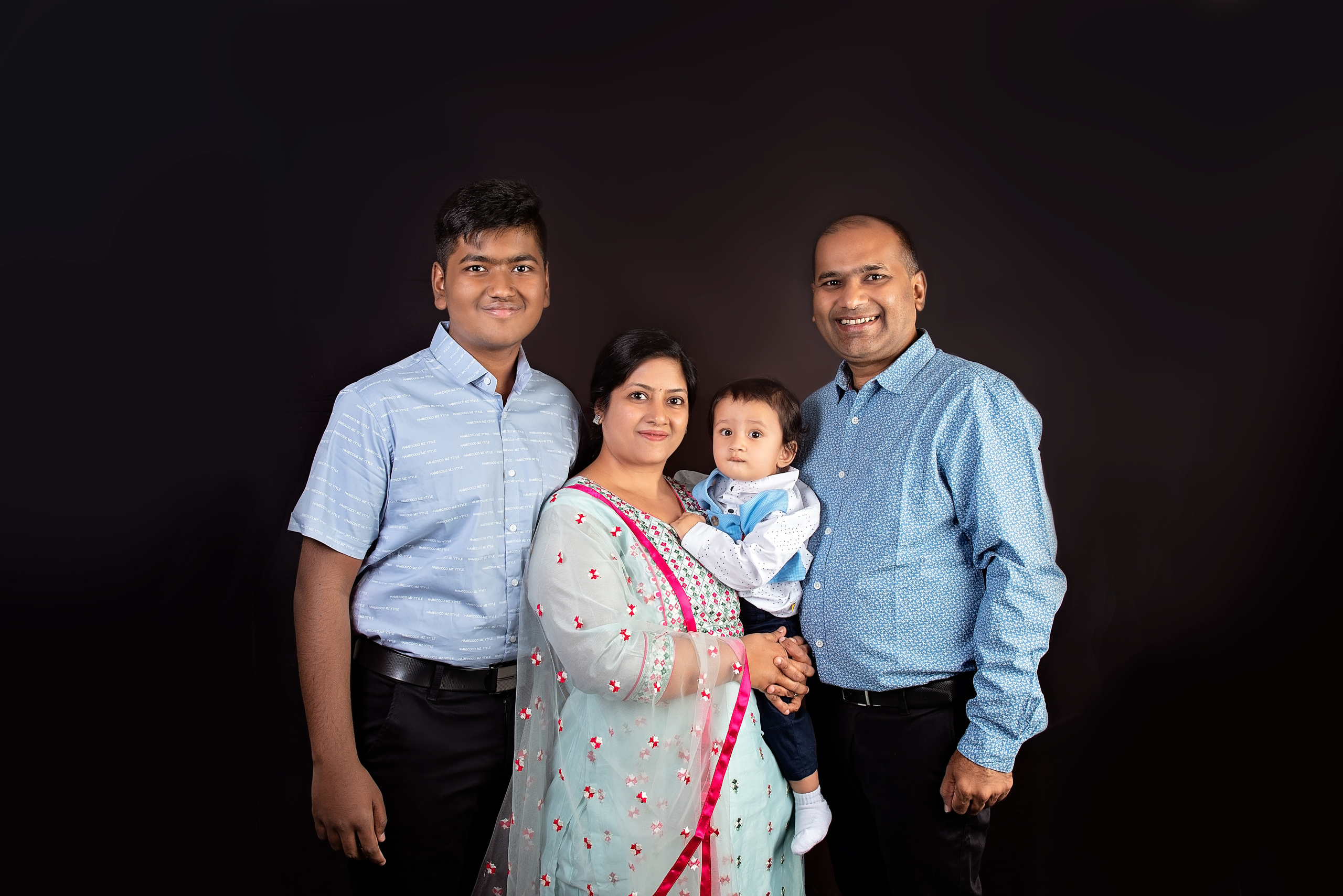 Indian Kenyan family father mother brother and 1 year boy Mombasa Kenya