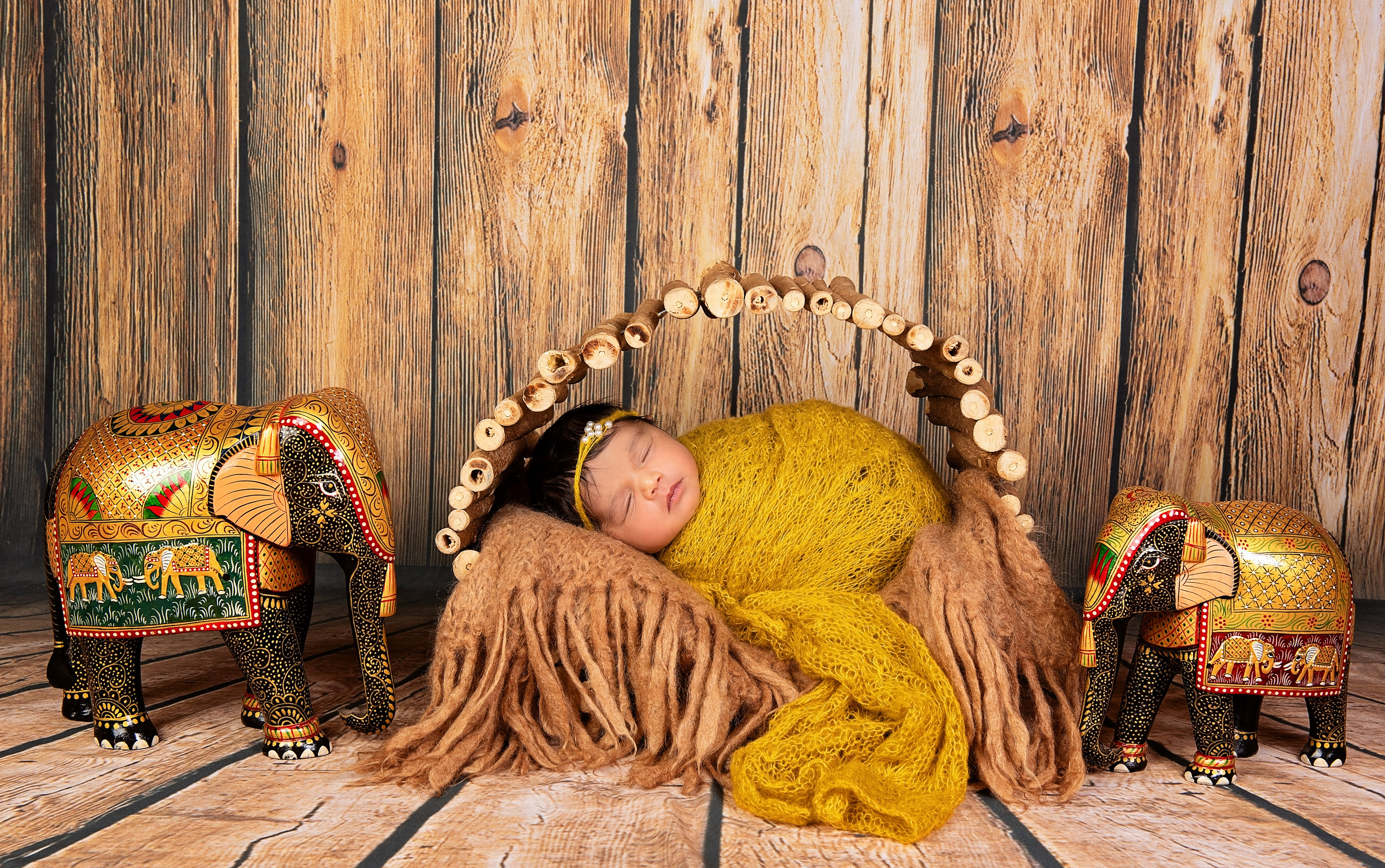 Amazing Asian baby girl in gold wrap newborn photo shoot Nairobi Mombasa Kenya