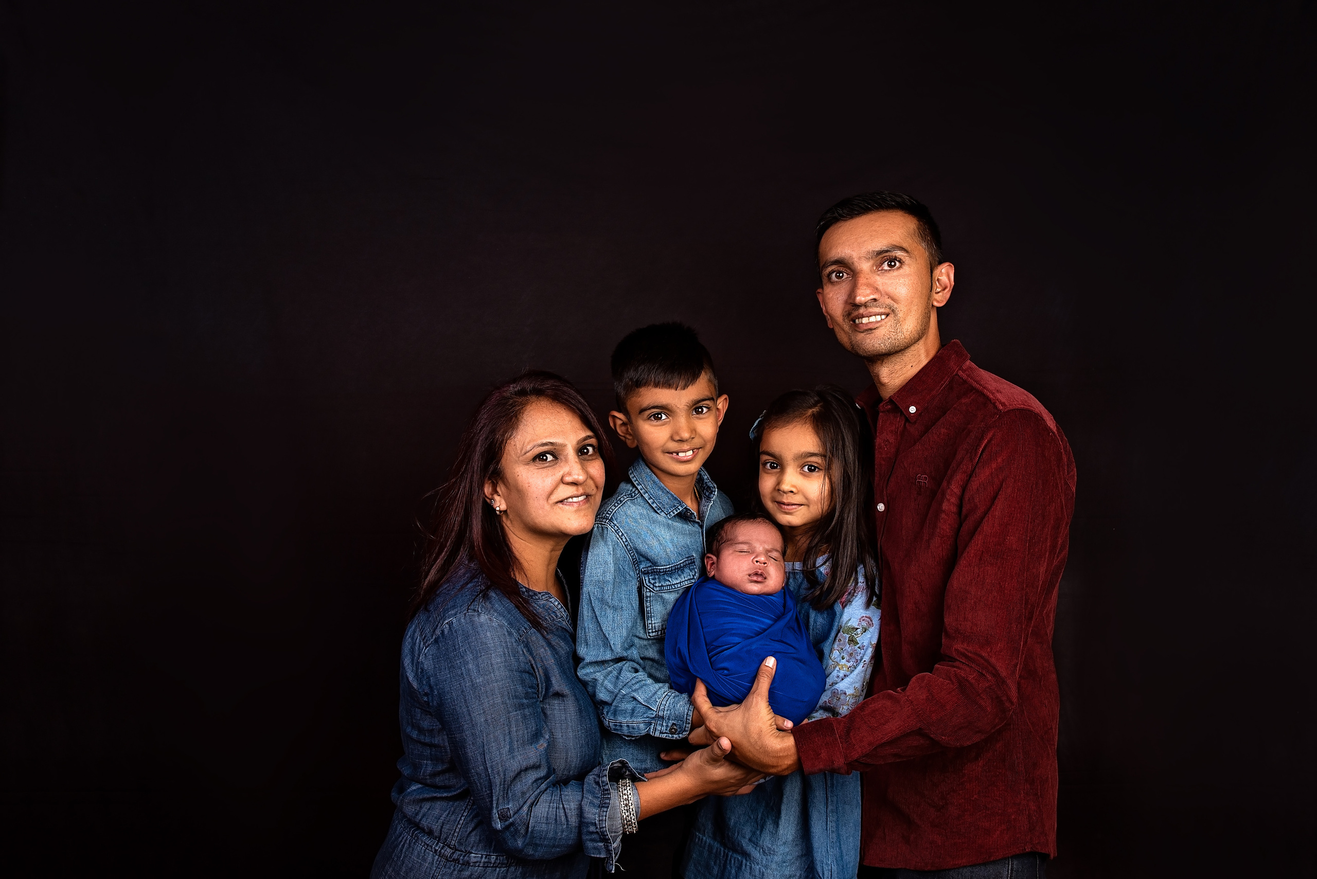 Indian Kenyan family father mother daughter brother newborn baby boy Mombasa Kenya