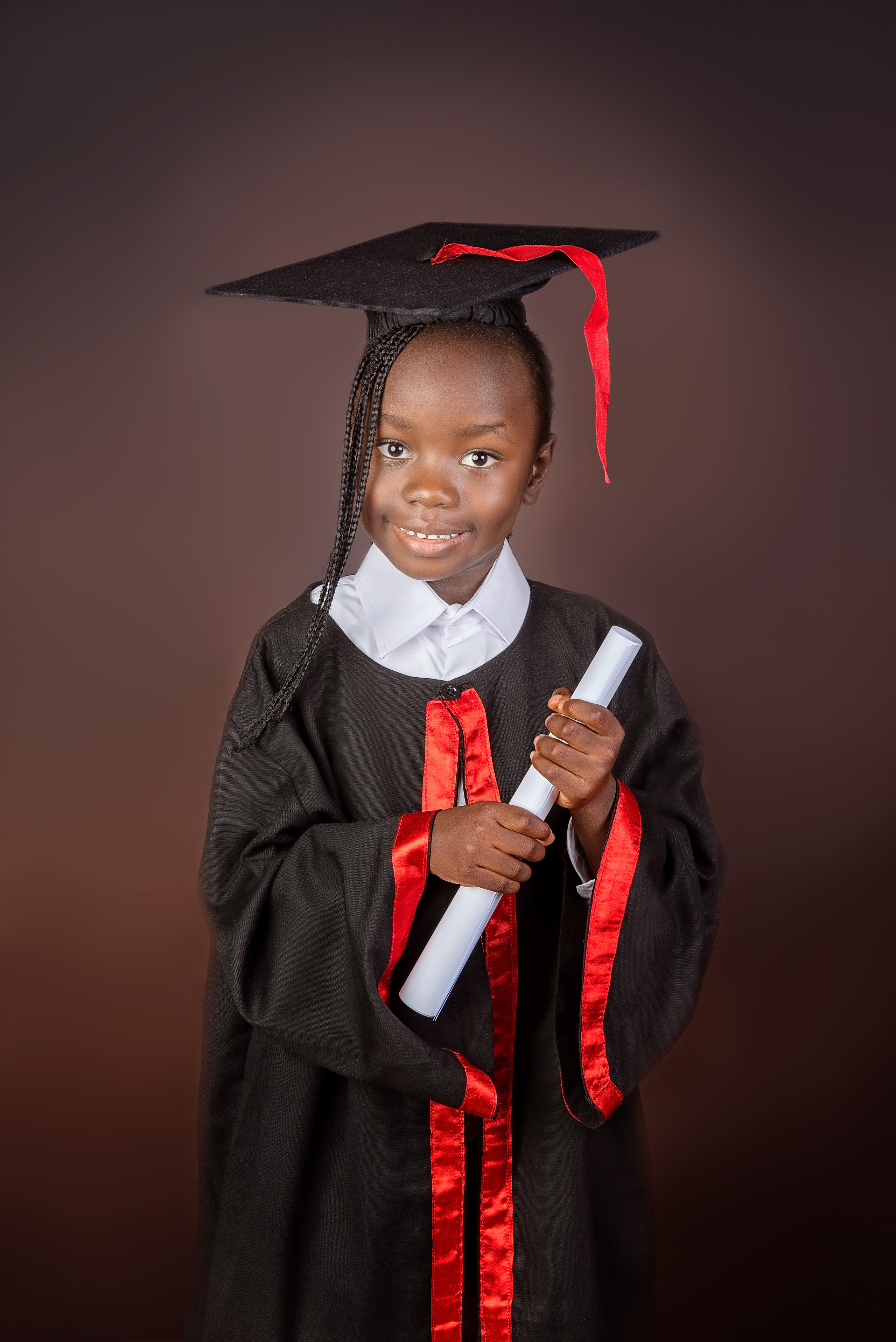 Kenyan graduation photo happy girl Nairobi Kenya 
