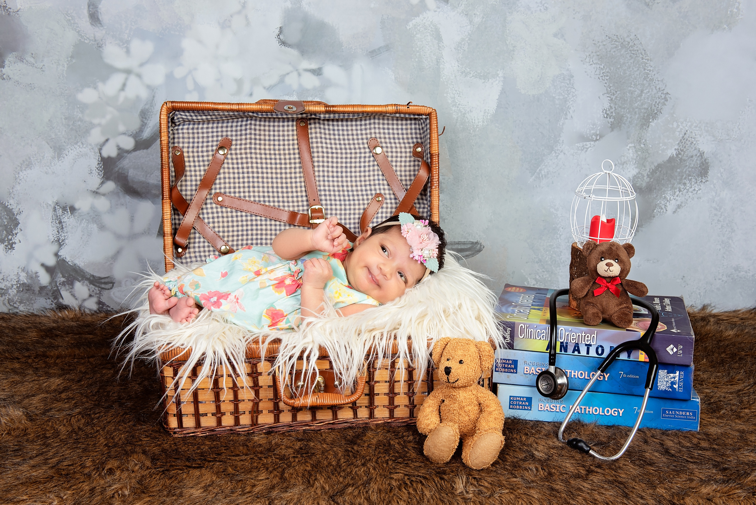 Newborn baby girl in the suit case photo shoot Nairobi Kenya
