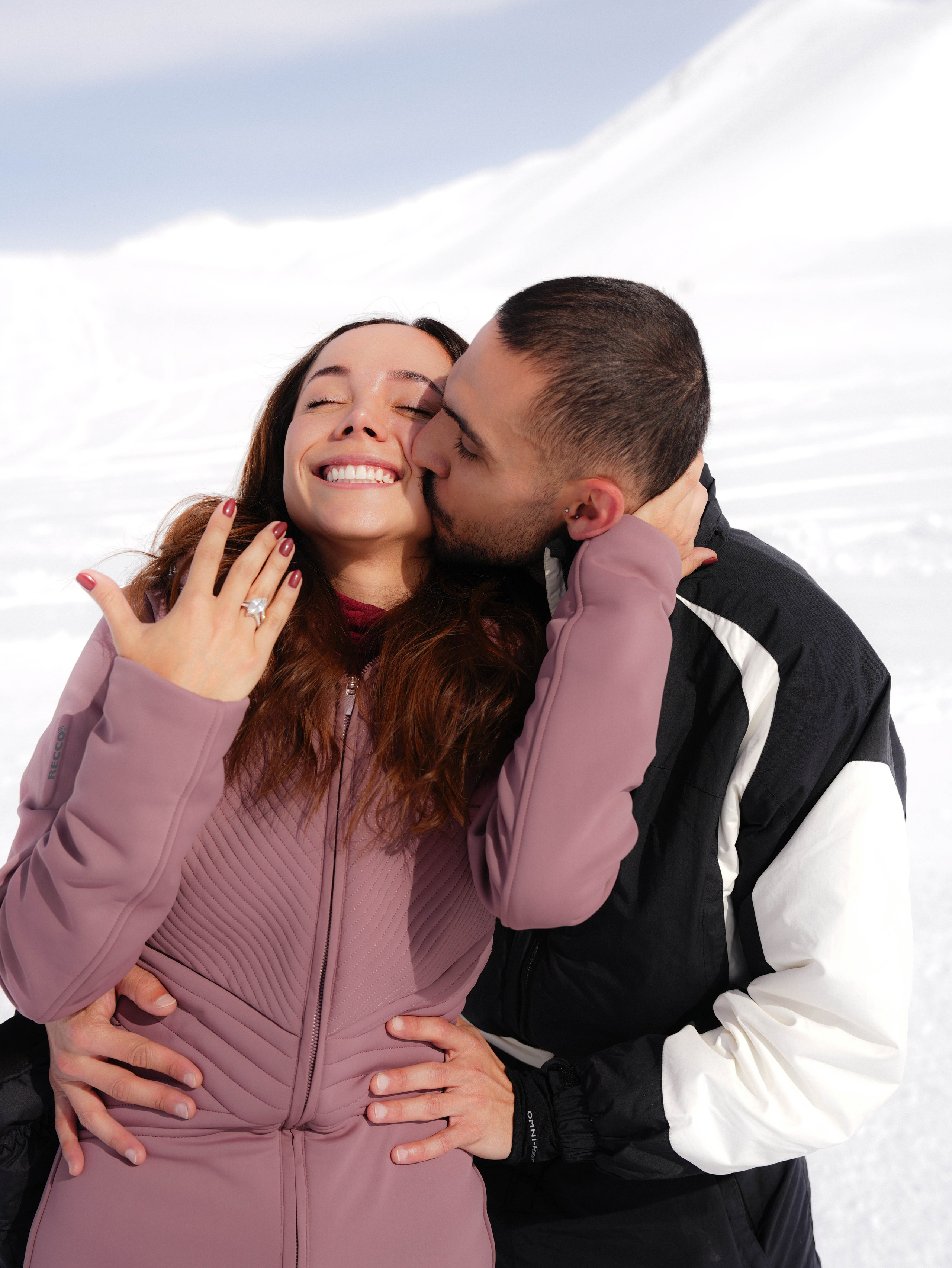 Man hugging woman after proposal moment