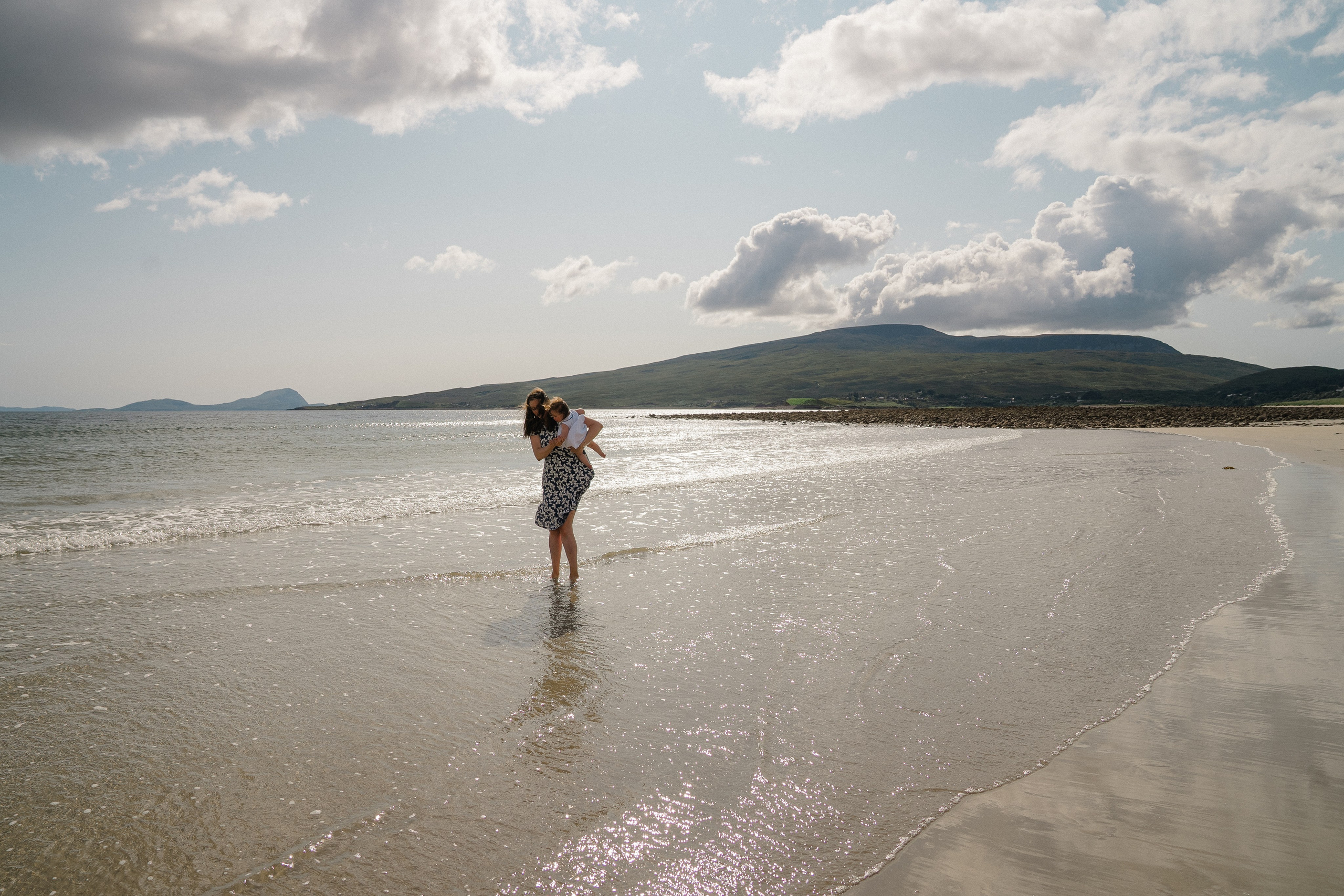 Darya and Mia at the ocean. Wedding and family photographer Ireland