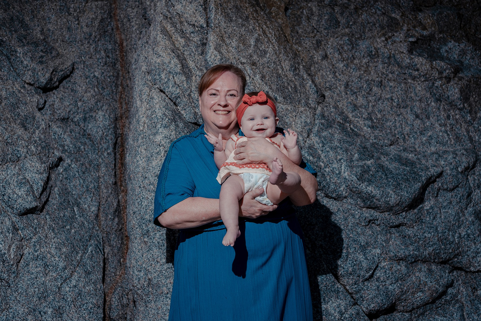 Final moments of a family vacation photo session at Playa Monumentos Cabo San Lucas with El Arco in the background