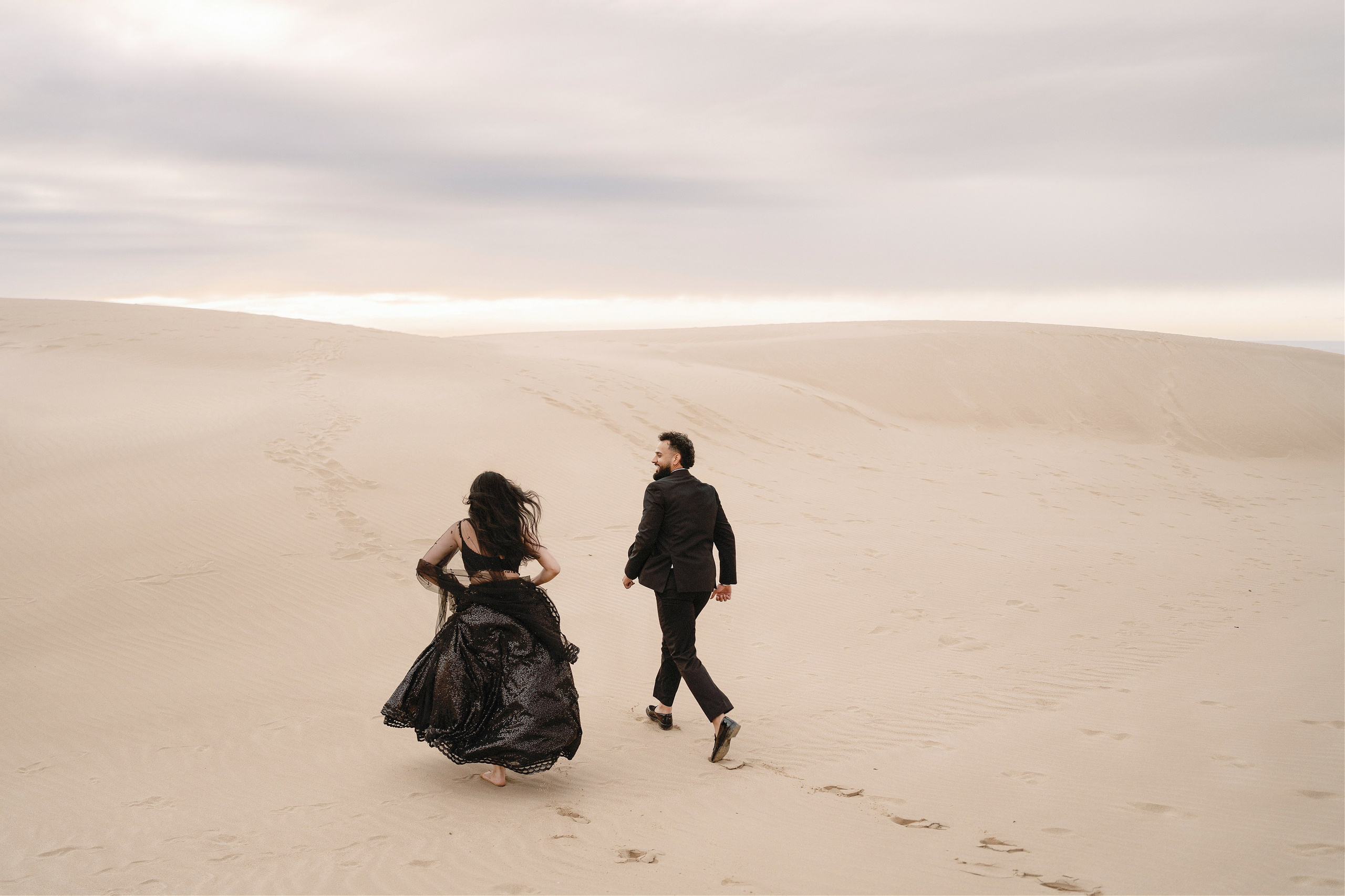 Elopement at Pismo Beach Sand Dunes, California. Wedding Photography & Videography Team in California, Los Angeles, San Francisco, San Diego and Travel