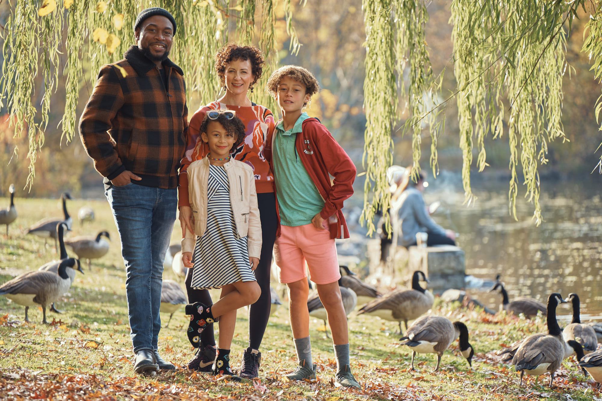 Stunning fall family photo shoot of an Afro-American family in Van Cortlandt Park, Bronx, NY.