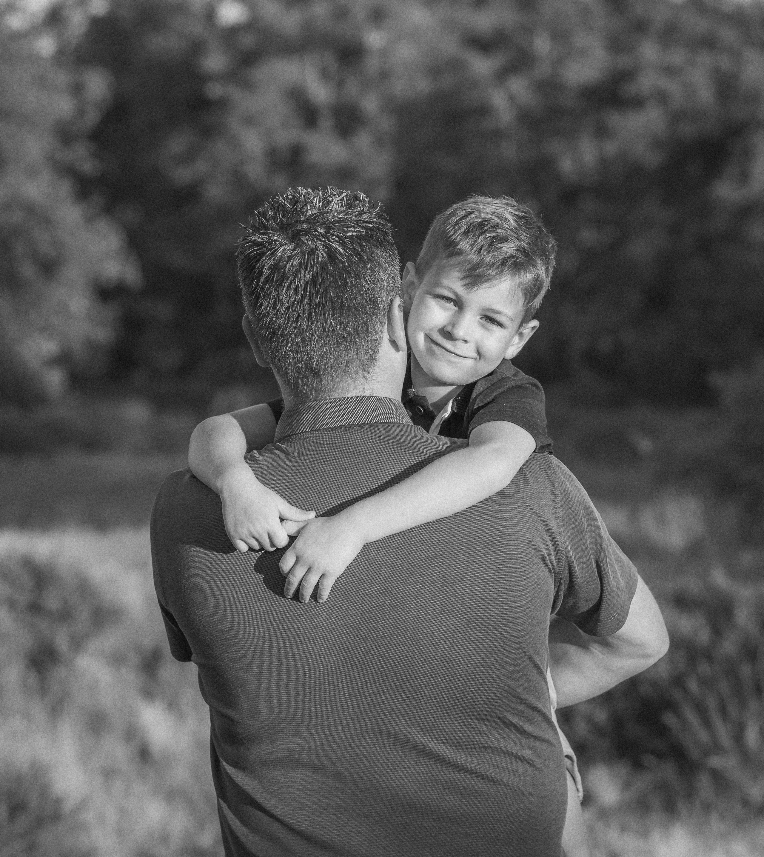 Kapture Fotografie - Warme en intieme familiefoto met lachende kinderen en ouders