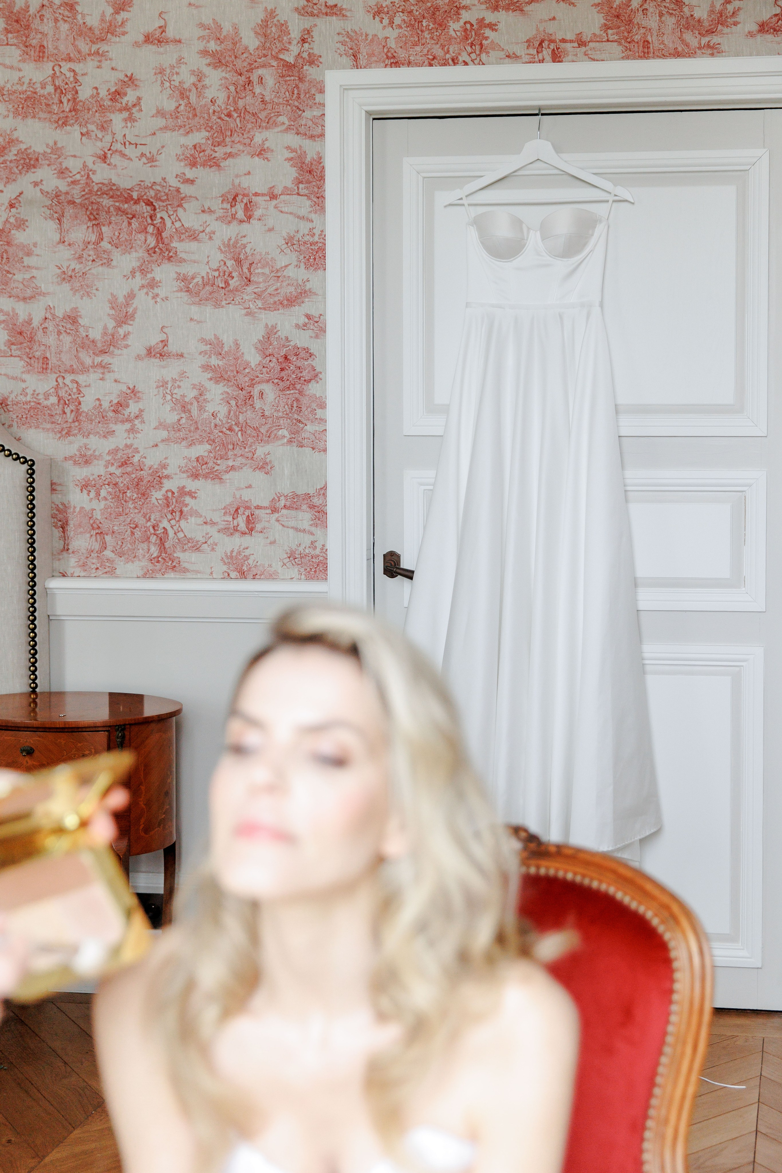 Intricate details of a bride's wedding dress captured in a French wedding photoshoot.